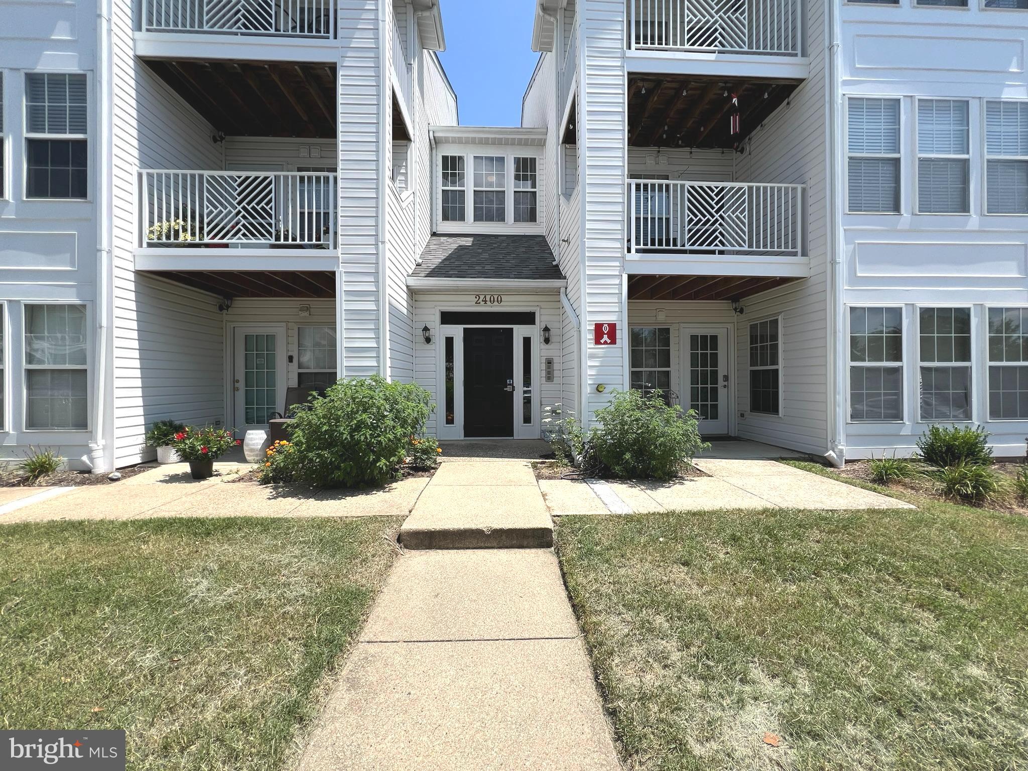 Gorgeous Light-Filled 2BR/2BA Penthouse Condo in Piney Orchard. Welcome home to this stunning, light-filled 2-bedroom, 2-bath penthouse condo located in the sought-after Piney Orchard community of Odenton. Featuring luxury vinyl flooring throughout, this spacious unit offers a bright and airy open-concept layout with soaring vaulted ceilings in the expansive living and dining area. The galley-style kitchen is equipped with stainless steel appliances, a pantry, breakfast bar, and an adjoining breakfast room that opens to a private balcony—perfect for morning coffee or evening relaxation. Enjoy the comfort of two generously sized primary suites on opposite sides of the condo for maximum privacy. One suite features vaulted ceilings, a walk-in closet and en-suite bath, while the second offers a dual-entry bathroom for added convenience. Additional highlights include a large laundry room with extra storage and an exterior storage closet on the balcony. Ideally situated near Ft. Meade, BWI Airport, the Odenton MARC train station, Annapolis, Baltimore, and Washington, DC—this condo offers unbeatable convenience for commuting and travel. Walking distance to schools, shopping and restaurants and all Piney Orchard has to offer!! Tenant occupied with 24 hours notice required. Home will be professionally cleaned.