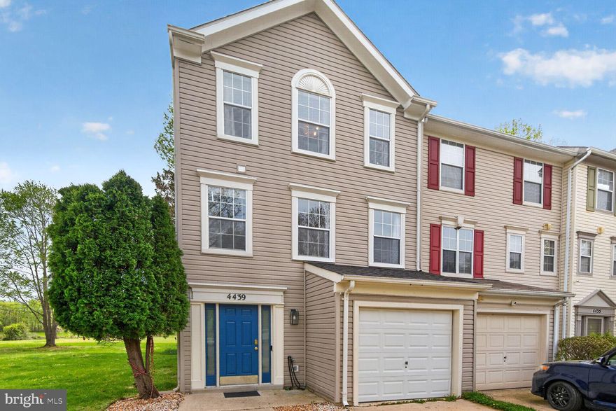 Welcome to 4439 Cornwall Ct, a beautifully maintained 3 BR | 1.5 BA end-unit townhouse in the sought-after Kings Grant community of Upper Marlboro. Built in 1993, this light-filled home spans three finished levels and offers approximately 1,676 square feet of thoughtfully designed living space on a 0.06-acre lot.

The main level showcases a bright, open concept layout with hardwood floors flowing from the updated kitchen through the dining area and into the inviting living room. The kitchen offers pantry storage and energy efficient appliances, while the living area opens to a spacious deck ideal for entertaining or outdoor dining. A well-placed half bath completes this level.

Upstairs, the top floor features three comfortable bedrooms and a full bathroom. The primary bedroom offers generous closet space, while two additional bedrooms provide flexibility for family, guests, or a dedicated workspace. 

An attached one-car garage leads directly into a versatile entry level den featuring a cozy gas fireplace and access to a private patio overlooking a tranquil pond and community green space, perfect for a home office, guest suite, or additional living area. This level also includes laundry and utility space for everyday convenience.

Residents of Kings Grant enjoy a wide range of community amenities including an outdoor pool, tennis and basketball courts, jogging and walking paths, playgrounds, and open recreational fields, creating a well-rounded lifestyle just outside your door.