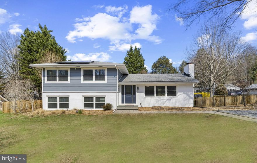 Set on a beautifully landscaped 0.34-acre corner lot in sought-after Winchester-on-the-Severn, this thoughtfully renovated residence offers a seamless blend of style, comfort, and everyday livability. A fully fenced backyard creates a private outdoor retreat, complete with a deck, patio, garden, playground, and storage shed, perfectly designed for both entertaining and relaxed daily living.

Inside, an open and airy floor plan is anchored by a vaulted ceiling and a striking brick fireplace, creating a warm yet elevated main living space. The living room, dining area, and renovated kitchen flow effortlessly together, with direct access to the deck for easy indoor-outdoor living.

The upper level features three bedrooms, including a spacious primary suite with a beautifully appointed ensuite bath, while two additional bedrooms share a well-designed hall bath. The lower level offers a comfortable family room with walkout access to the patio, along with two additional rooms ideal for guest bedrooms, offices, or flex space, complemented by a full bath. Just beyond, an additional lower level expands the home’s versatility with a dedicated laundry room, playroom, gym area, and generous storage space.

Located just minutes from Route 50 and downtown Annapolis, Winchester-on-the-Severn is a vibrant, amenity-rich waterfront community offering residents access to a private beach on the Severn River, marina, boat ramp, multiple piers, beach pavilion, playground, dog beach, and the Chase Creek Swim Club. The nearby B&A Trail adds even more opportunity for outdoor recreation. Positioned within the Blue Ribbon Broadneck School District and convenient to Baltimore, BWI, Ft. Meade/NSA, and Washington, DC, this home presents an exceptional opportunity to enjoy a coveted neighborhood lifestyle in a beautifully updated setting. Welcome Home!