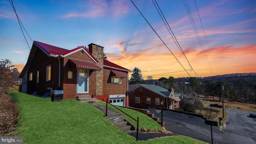 Welcome to your dream home! Nestled in a serene and picturesque neighborhood, this charming 2-bedroom, 1-bathroom gem is a true haven of comfort and style. Situated just outside city limits, enjoy the tranquility and escape the hustle and bustle without sacrificing convenience.

Step inside to discover a meticulously maintained interior boasting a few great upgrades throughout. The new metal roof and replacement windows provide both durability and energy efficiency, while the recently installed heat pump ensures optimal comfort year-round. Say goodbye to sweltering summers and chilly winters with the added luxury of central air conditioning.

Entertain with ease in the spacious living area featuring a stunning stone fireplace, perfect for cozy evenings with loved ones. Host gatherings effortlessly in the expansive all seasons room, flooded with natural light and offering panoramic views of the lush surroundings. Step out onto the huge rear deck, ideal for al fresco dining or simply basking in the beauty of nature.

The kitchen is big enough for the chef in you to prepare a huge meal yet small enough you won't get lost. Retreat to the inviting bedrooms for rest and relaxation in front of your warm fireplace.

Storage will never be an issue with the walk-up attic boasting amazing open storage possibilities. Keep your vehicle protected in the attached 1-car garage, with the convenience of a paved driveway for ample parking.

Experience the ultimate in peaceful living on a dead-end road, surrounded by neighbors who take pride in their homes and community. Best of all, enjoy the perks of no city taxes while still being within reach of all the amenities you desire.

Don't miss out on this rare opportunity to own a slice of paradise in an amazing location. Schedule your showing today and make this your forever home!