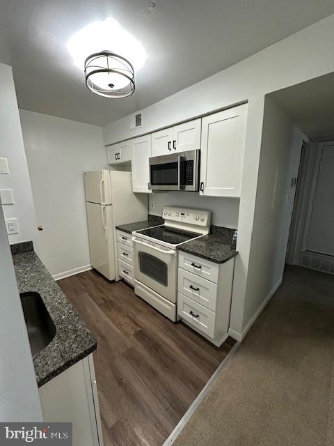 Totally updated 2 bedroom, 1 bath main level condo with great renters already in place paying $1,950/mo. Granite counters in kitchen and bath, new stainless steel frig (just added, not pictured), new LVP in kitchen and bath in 2022, new carpet 2022. Covered balcony with sliding glass door. Has all appliances - washer, dryer, dishwasher, range, built-in microwave, disposal. Primary bedroom has walk-in closet, second bedroom and living/dining each have large closets, nice kitchen pantry. Multiple pools, tennis courts, plenty of parking right outside the door. In the West Springfield school pyramid, walking distance to schools and shopping, bus stops right out front, VRE less than 1 mile away. HOA covers all exterior maintenance, trash, master insurance, water. Only utilities are electric and cable/internet.