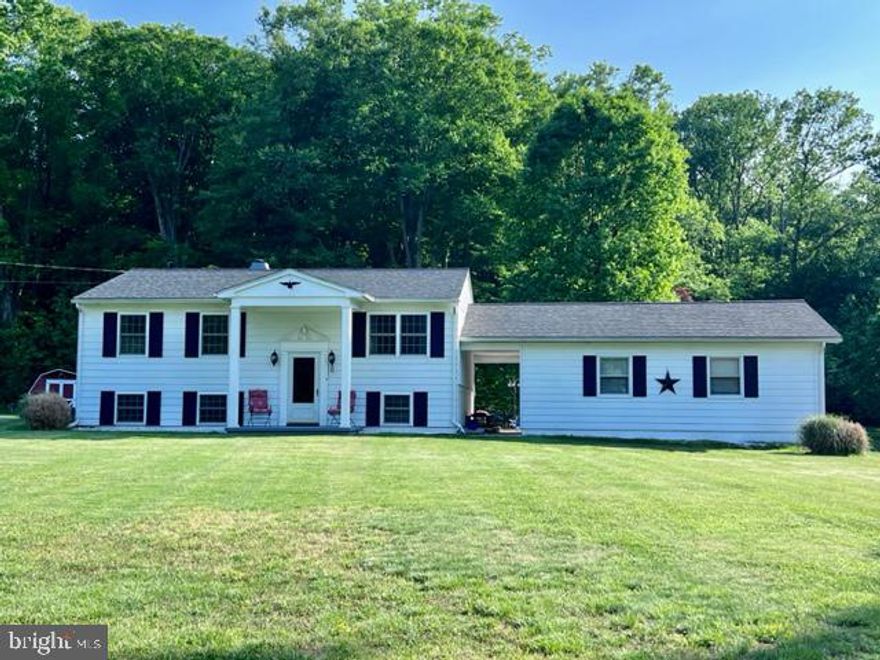 Affordable move-in ready opportunity! Lovingly maintained by the same owners for over 50 years, 4-bedroom, 1 bath split-foyer, situated on a peaceful and private .91-acre lot, with close proximity to Rt 40, I-95, Harford County and the Delaware State Line. Main level highlights include 3 bedrooms, bathroom, living room (original hardwood flooring exists beneath the carpeting in bedrooms and living room) and a spacious eat-in kitchen that includes access to the deck and sprawling tree-lined backyard. Ideal for entertaining, family activities and gardening, with plenty of room for children and pets to run and play, along with a wooded area offering mature trees and idyllic walking paths. Truly a nature lover's paradise! Lower-level details include a 20' X 15' family room, laundry/utility room, bonus area and 4th bedroom, which could be utilized for many options including a home office, exercise area or hobby room (includes a closet). Additional property details include an immaculate detached 2-car garage (conveniently accessed through a breezeway) that includes a workbench and additional storage area. Upgrades include an architectural shingled roof and new gutters added in 2018, water heater (2022), HVAC (2016), windows (2008), Generac generator (2015), new sump pump and upgraded interior plumbing. **PLEASE NOTE--see Documents regarding Property Well and Driveway Easements** Conveniently located, yet off the beaten path...If you are searching for an affordable and well-kept place to call home, your search is over...62 Otter Point Road...Welcome Home!!!