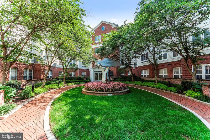 Welcome to The Sierra! This sought-after and pet-friendly condominium community is located in the heart of Arlington near shops and restaurants, plus all that Glencarlyn Park has to offer including trails, playgrounds and a dog park.    This top floor two bedroom, two bathroom unit is the one of the largest in the building at 1,300 square feet of finished space and has been meticulously maintained, wonderfully updated and is flooded with light. The open and airy floor plan with bamboo floors and tall ceilings throughout flows perfectly for relaxing and entertaining alike. A welcoming foyer opens to the spacious kitchen that features ample counter and cabinet space as well as granite counters, stainless steel appliances and a breakfast bar. Off the kitchen is the formal dining room featuring tray ceilings and a large living room with access to the private balcony - a wonderful extension of the unit's living space. A full bathroom, coat closet and laundry with new washer and dryer can be found right off the foyer as well. The king-size owner's suite is highlighted by a tray ceiling, a wall of windows with new black-out curtains, a deep walk-in closet with built-ins and a private en-suite bathroom with separate shower and bath.  The second bedroom is located on the other side of the unit, with access to the balcony and also has a large closet. The private balcony overlooks tree tops and gorgeous grounds. Did we mention the brand new HVAC, installed just this year?  New washer and dryer in unit as well! One car garage parking also conveys with the unit.  Pets are warmly welcomed!   The monthly condo fee covers the elevators, garage parking, building management, a fitness center, grounds up-keep, water, and trash.  Sellers are offering a $5,000 painting allowance/closing cost credit at settlement!!