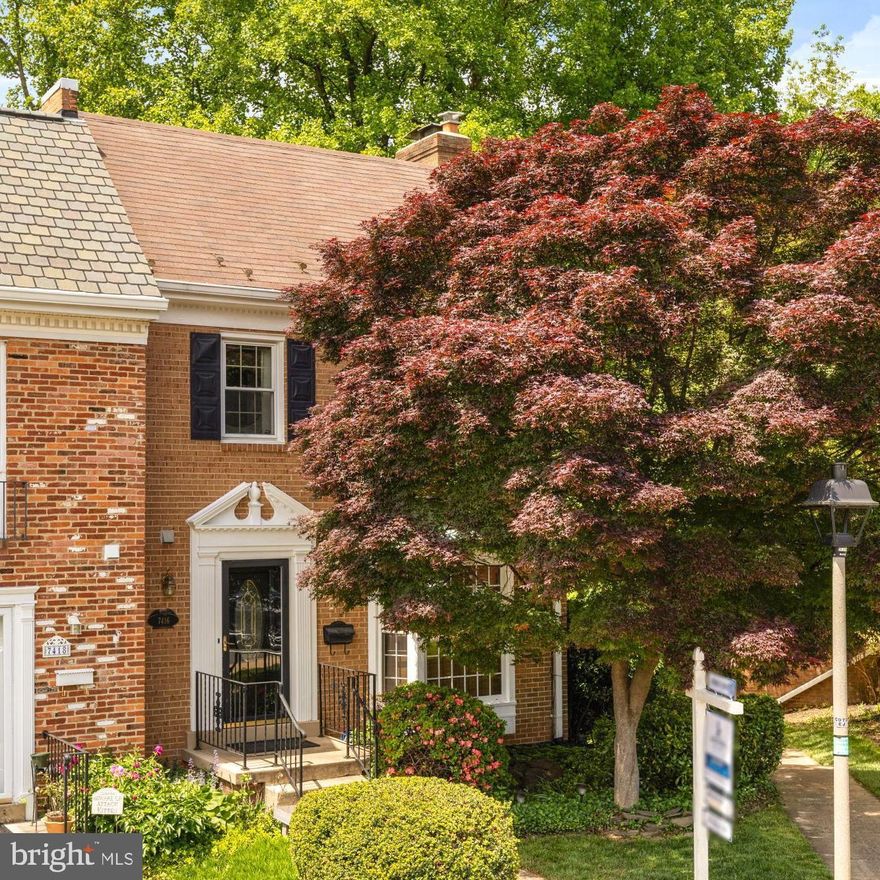 Unbeatable McLean location with a peaceful neighborhood feel. Live just minutes from world-class shopping, dining, and public transit—while tucked away in the quiet, tree-lined Hallcrest Heights community.

This spacious end-unit 3-bedroom, 2 full and 2 half-bath home offers over 2300 sq ft with hardwood floors, a bright open layout, and timeless character throughout. The main living area features custom built-ins, a bay window, and a classic fireplace, flowing into a formal dining space with elegant crown molding.

The kitchen includes stainless steel appliances, granite countertops, wood cabinetry, and a cozy breakfast nook.

Your primary bedroom is spacious with tons of natural light and closet space. Your two additional bedrooms are very roomy and airy - exceeding all of your expectations.
Downstairs, the walk-out lower level offers flexible space for a second living area, office, or gym.

Step outside to an expansive private patio surrounded by greenery—your own quiet retreat just minutes from it all.

Parking: Two assigned spaces.