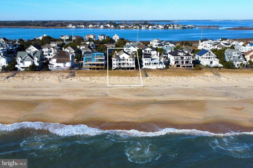 Absolutely stunning oceanfront views from nearly every angle of this timeless beach home that is situated on a large lot with 75 ft of oceanfront property. This spacious home was architecturally designed for multiple generations to enjoy time together with 6 bedrooms plus an office that could easily be a 7th bedroom, and includes a master suite with a beautifully updated bathroom and office space. Take the elevator to the impressive great room with soaring ceilings, and large kitchen with high end cabinetry, center island with seating, a beautifully tiled backsplash, and a separate wet bar. Just off the great room are 2 large sitting areas and an expansive waterfront deck creating an ideal layout for entertaining large gatherings. Additional outdoor living spaces include multiple decks and a large screened porch for enjoying the evening sunset. Multiple outdoor showers make cleaning up from the beach a breeze and 2 garages plus a shed allow plenty of storage space for all of your bikes and beach gear. Offered fully furnished, this home is ready to be enjoyed. Located in the highly sought after gated community of Breakwater Beach featuring a pristine private lifeguarded beach, this is the ideal location for all of your future vacations.