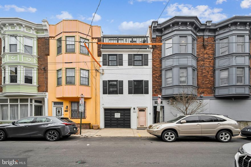 Stunning Home in the Heart of Queen Village!

Nestled just one block from the highly sought-after Meredith School, this exceptional fully renovated  3-bedroom, 2 full bath, and 2 half bath home offers a rare blend of luxury, versatility, and prime location.

First Floor: Versatile Live/Work/Entertainment Space

Step into a unique multi-purpose area perfect for a home office, studio, or entertainment lounge, seamlessly leading to a private backyard retreat. A half bath on this level adds convenience, while the attached garage offers secure parking and extra storage.

Second Floor: Elegant Living & Chef’s Kitchen

The front living room exudes warmth with a cozy fireplace, ideal for relaxing or entertaining. A renovated kitchen and dining area feature high-end GE cafe appliances, sleek finishes, and thoughtful design. A second half bath completes this level.

Third Floor: Comfortable Bedrooms & Laundry Convenience

The front bedroom offers natural light and ample space, while a full hallway bath serves this level. A dedicated laundry closet and an additional hallway closet provide practicality. The rear bedroom overlooks the backyard, creating a peaceful retreat.

Fourth Floor: Luxurious Primary Suite with City Views

The primary suite spans the entire top level, featuring a fireplace, a Juliet balcony, and a full-length open closet along the hallway. The renovated primary bath is a spa-like oasis. To top it off, step out onto the private front deck and take in breathtaking city views.

Location Perks

Situated in the very sought-after Meredith School Catchment! Enjoy the best of city living with easy access to restaurants, shops, parks, public transportation and more—all while having a peaceful retreat to call home.

Don’t miss this opportunity—schedule a tour today!