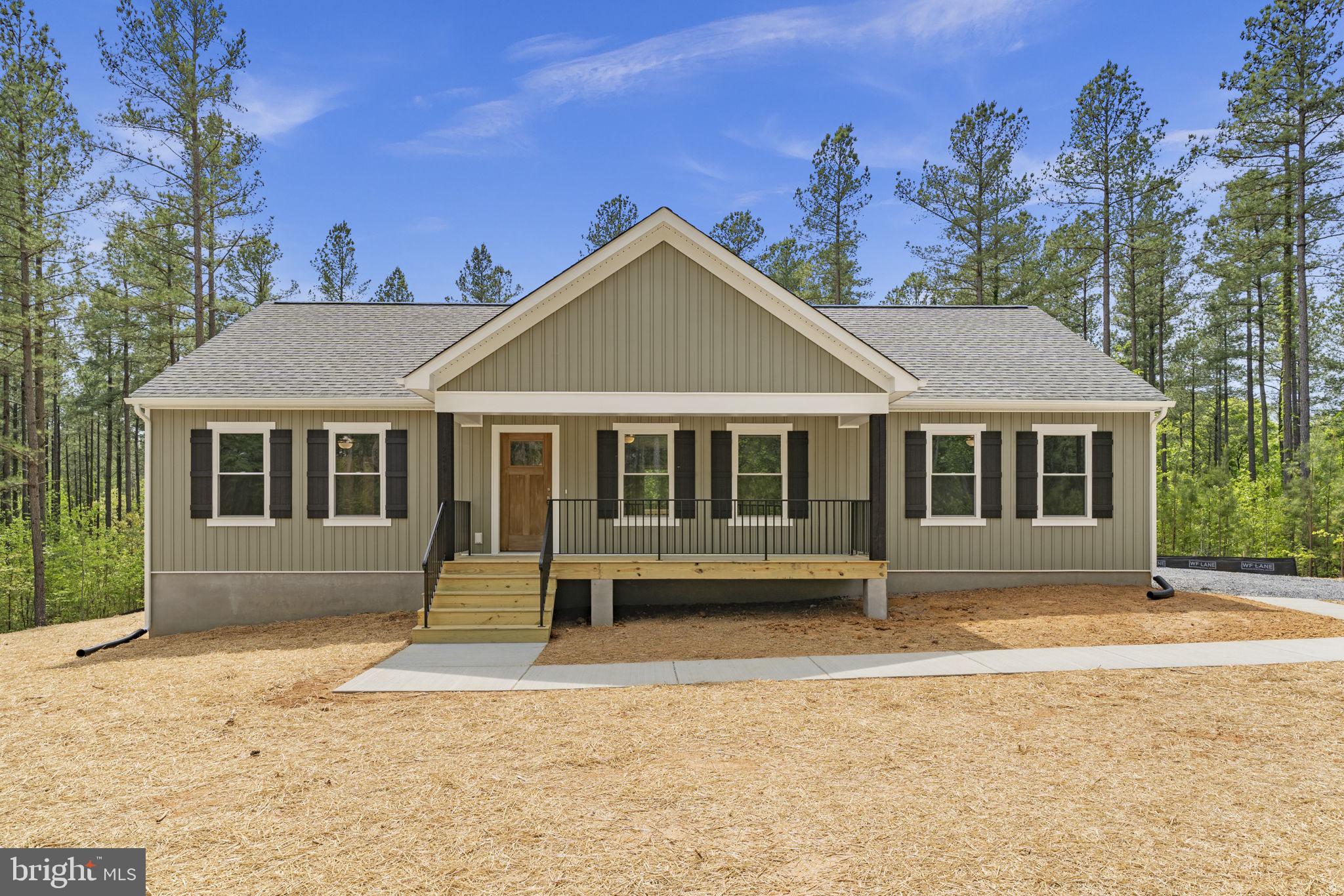 This is a to-be built home! The Harper III plan by Vertical Builders offers 3 bedrooms, 2 baths, and a first-floor primary suite! The spacious kitchen is open to the adjoining dining area. The heart of the home is the family room. The first-floor primary suite offers a walk-in closet and an ensuite bath with a walk-in shower, and a water closet. Bedrooms 2 and 3 feature walk-in closets. A laundry room and hall bath complete the first floor. The exterior offers a front covered porch perfect for relaxing evenings. Compass Cove is the newest water-access community on the private side of Lake Anna. Set along the scenic shores of this sought-after destination, Compass Cove offers 1+ acre homesites that combine spacious outdoor living with a welcoming neighborhood feel. Select homesites include a deeded boat slip, making it easy to enjoy boating, fishing, and the best of waterfront living. Boat slips will also be available for purchase.