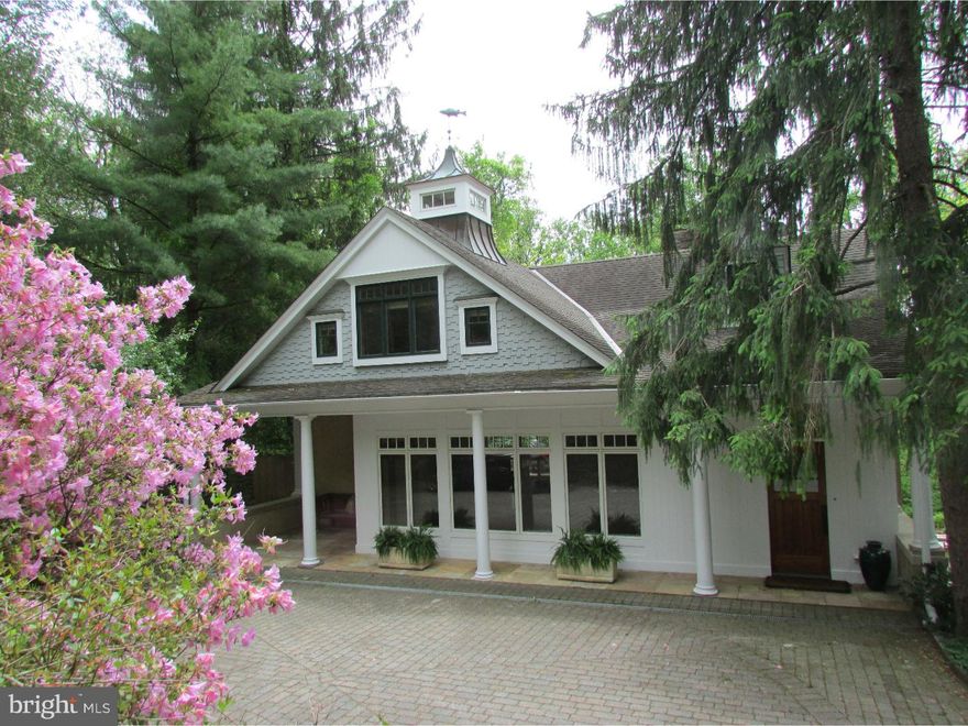 A perfect country retreat! Hidden down a long driveway, this lovely carriage house has spectacular views of the Wissahickon Valley and Fairmount Park. Originally this carriage house was part of a large estate, which was built in 1902 and sub?divided in the early 1960s. Completely renovated in the Arts and Crafts style, the floor plan is open and spacious with views in every direction. The general condition and theme of the house has been enhanced with special artistic touches, including beautiful wood, leaded glass cabinets and decorative doors. Enter the home into the Great Room and open Kitchen with glass doors leading to a private outdoor deck. The Living Room has a large stone fireplace and glass doors to the outdoor deck as well. The Den has built?in bookshelves with an adjacent full bath with natural stone walls. On the lower walk out level, there are two bedrooms and two full baths with doors to a large flagstone patio. On the second floor the Master Suite includes a sitting room, an office, a master bedroom and two separate full bathrooms. The grounds are wooded and beautifully landscaped. Steps lead from the side of the house to a large in ground pool, a flagstone patio, and a pool house with fireplace. Walk to the train and the shops of Chestnut Hill, only minutes away. This is truly a one of a kind property.