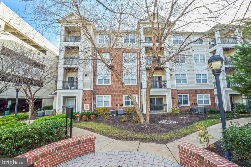 Welcome home to this charming 1 bedroom, 1 bath condo with a balcony located on the 4th and top level of this conveniently located, gated community. The kitchen includes an island and has rich dark hardwood cabinetry, granite countertops, gas cooking, and stainless appliances. A stackable washer-dryer is in the unit. Two ceiling fans keep the air circulating and the unit is conveniently located near the elevator without being too close.  A new gas,  HVAC, and Water Heater was just installed with the latest hydronic technology. Bryson amenities include a fitness center, clubhouse, BBQ areas, business center, 2 community pools, a hot tub, walking paths, and well-maintained common grounds. The shopping center featuring restaurants and a Harris Teeter is right across the street.  This is a great location for transportation with WMATA Silver Line, Herndon Metro Station, and Dulles International Airport just minutes away!