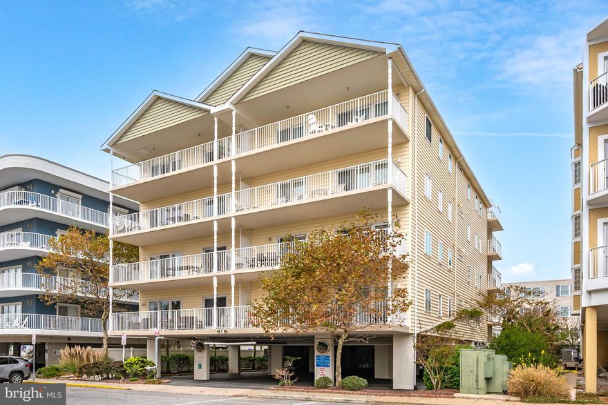 Welcome to your dream beach retreat in the heart of Ocean City! Just steps from the sand and surf, this airy two-story condo offers 3 bedrooms, 3 bathrooms, and the perfect coastal lifestyle. From the open concept living space to the private deck with ocean views, every corner invites relaxation. The primary suite boasts its own private balcony, a spacious ensuite, and a walk-in closet. With a dedicated storage room for your beach toys and access to a rooftop deck showcasing both ocean and bay views, this is beachside living at its finest.