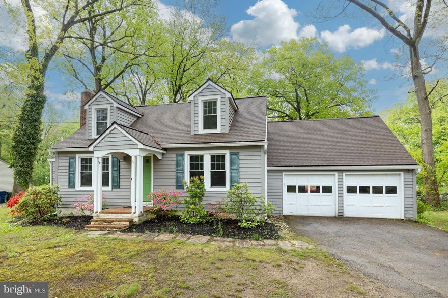 Welcome to this charming Cape Cod set on a lovely wooded lot with a flat yard and a peaceful setting tucked back from the road. This home offers numerous updates throughout, including replacement windows and a renovated primary bath in 2018, an updated kitchen in 2019, a renovated half bath in 2020, new siding and roof in 2024, and newer heat and A/C mini splits in 2021 and 2026, plus a new refrigerator in 2025. Enter into the inviting living room featuring a cozy wood-burning fireplace and beautiful original hardwood flooring that continues through much of the home. The updated kitchen overlooks both the front and rear yards and opens to the dining area and sitting room, creating a comfortable and functional flow for everyday living and entertaining. Door from the sitting room leads to a rear deck perfect for relaxing or enjoying the private backyard setting. The first floor also includes the primary bedroom with double closets, and a full hall bath. Upstairs you will find two additional bedrooms and a convenient half bath. A unique bonus space above the attached two-car garage offers flexibility for a home office, playroom, exercise room, or hobby area. The finished portion of the basement provides additional living space ideal for a game room or media area, while the unfinished section includes laundry hookups, storage, utilities, and garage access. Conveniently located just minutes from shopping, dining, banking, and Route 30 bypass access, this delightful property combines charm, updates, and everyday convenience.