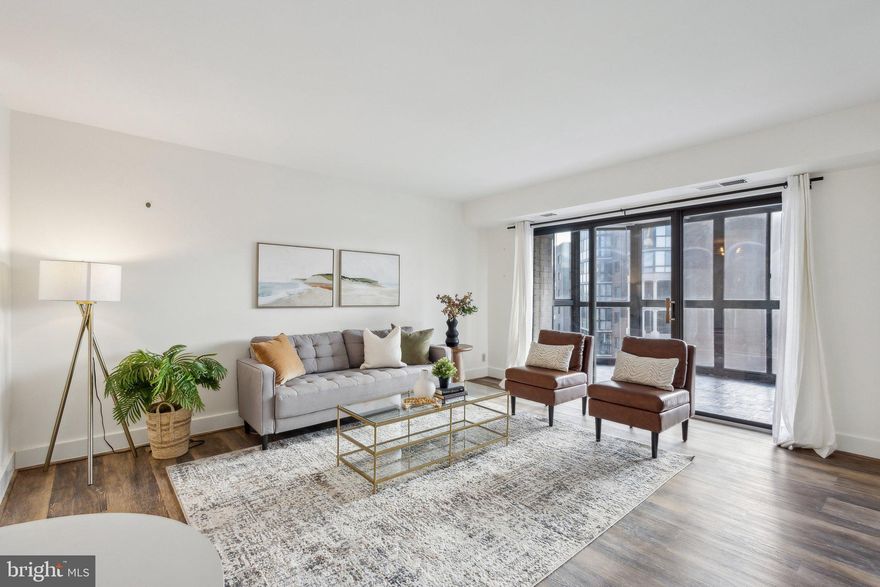 Introducing The Belvedere! This stunning 2 bed, 1 bath high-rise condo offers nearly 1,000 square feet of beautifully updated living space, perched on the 16th floor with sweeping views of Arlington.

The open-concept main living area is flooded with natural light thanks to floor-to-ceiling windows that lead into a sunroom—perfect for lounging or entertaining. Recently updated with fresh paint and modern tile, the sunroom offers a bright, airy retreat with panoramic views that truly feel like a private oasis in the sky.

The fully renovated kitchen boasts sleek quartz countertops, a modern backsplash, updated stainless steel appliances, and stylish fixtures—perfect for any home chef. The spacious primary bedroom features a private, remodeled en-suite bathroom complete with contemporary tile work, a new vanity, and a soaking tub. The second bedroom offers ample space and flexibility, ideal for a guest room or home office setup.

Enjoy premier amenities including a resort-style outdoor pool, fitness center, tennis courts, 24-hour concierge, on-site convenience store, and a stylish party/club room.

Centrally located in the heart of Arlington, you’re just minutes from Ballston Quarter, Georgetown, fine dining, parks, public transportation, grocery stores, and entertainment options galore.

See our attached Property Highlights Sheet for a list of updates. 

Parking Details: 168 (on level G3)
Storage Unit: A-73 on the first floor