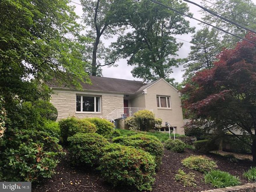 Sunny & spacious 5BR/3BA home oozing with charm in sought-after Lee Heights! Features gleaming hardwood floors, updated baths & kitchen, and spacious deck.  Main level includes updated kitchen with stainless steel appliances, glass tile back splash, breakfast bar and opens to dining/living room and sunroom with door leading to spacious deck and Gazebo.  An en suite primary, two additional bedrooms and full bath complete the main level.   The finished upper level has 2 additional rooms. Lower level features 3rd spa like bathroom, den and spacious rec room and utility room, additional storage and door to garage. Great outdoor living space with deck & gazebo that overlooks lovely landscaped yard in enchanted wooded setting. Mins to 66, Clarendon, and Ballston.  Yorktown School Pyramid.