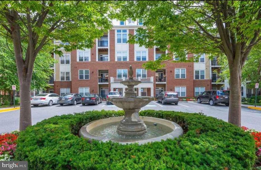 Rare opportunity to own one of Fallsgrove's extra large luxury 3 generous Bedrooms with 3 Bathrooms PLUS DEN condo with nearly 2700 sq ft of living! Unbelievable closet and storage spaces.Private Garage and separate storage unit convey. Wide plank hardwood floors, gorgeous granite/stainless kitchen, 2 covered porches facing back courtyard.