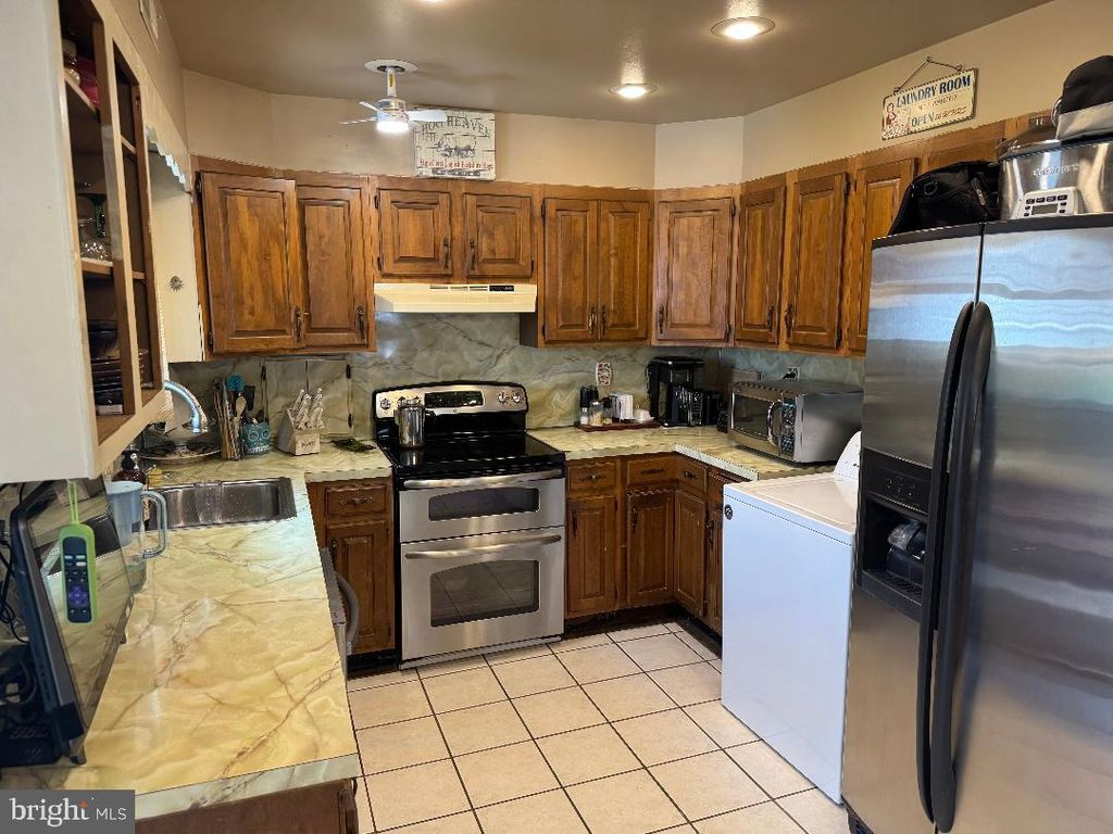 Photo of 46 Trail Road, LEVITTOWN, PA 19056 (MLS # PABU2115114)