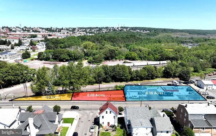 Triple Net Investment Group is pleased to present this exceptional unbranded gas station opportunity 
on PA 93—12,000+ VPD – E Broad Street in Hazleton, featuring a high-income convenience store, excel
lent traffic and visibility, ideal for auto repair, auto sales, or other complementary uses. Property comes 
with 2 additional parcels adjacent to the site. Strategically located in a rapidly developing area, the property is just steps away from major growth projects, including Troy Ridge Associates LLC’s planned 660-unit  housing development, the recently opened 386,000 sq. . fully automated Lineage Logis cs cold storage facility (2024) serving 60 million people within a 250-mile radius, and the soon-to-arrive RJW Logistics Group’s 1+ million sq. ft. East Coast distribution center that will bring over 350 jobs and enhance regional supply chains. This plug-and-play investment at 345–419 E Broad Street offers strong current revenue, substantial upside potential, and a prime position in Hazleton’s thriving commercial landscape.  

NO SUPPLY AGREEMENT!

In association with 
Brian Brockman 
License #: RM423816  
Bang Realty-Pennsylvania Inc