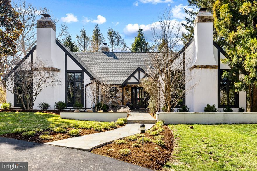 Approximately 4200 Sq Ft Nestled in Wynnewood’s most sought-after school district, this stunning English country estate blends timeless elegance with modern luxury. Designed by renowned architect Ann Capron and meticulously updated, this Tudor-style masterpiece sits on a private, lushly landscaped lot with a circular driveway and a completely redesigned heated pool.

Inside, exquisite craftsmanship shines with pegged hardwood floors, rich woodwork, and vaulted ceilings. The expanded family room features a dramatic stone fireplace, built-ins, and seamless indoor-outdoor flow. The all-new chef’s kitchen is a showstopper, boasting custom cabinetry, exquisite quartzite countertops, and top-of-the-line appliances.

The first-floor primary suite is a serene retreat with a fireplace and spa-like bath. Upstairs, additional bedrooms offer flexibility for guests or office space. Multiple off-leash hiking trails are just minutes away, making this home perfect for those who love both luxury and nature.

A rare opportunity to own a truly exceptional property in a premier location!