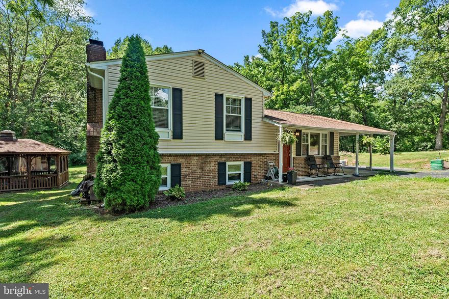 *** OPEN HOUSE   Saturday, Aug. 10th,  1:00 - 3:00 pm ***      Welcome home to your spacious 3 Bed 3 Full Bath, split 4-level detached home on 1.36 acre lot backing to trees. The main level features the living room and update eat-in kitchen with upgraded stainless steel appliances, island with butchers block, and pantry for storage. The upper level offers 3 spacious bedrooms and 2 renovated full baths. The primary suite is an oasis after a long day, with a private attached Full Bath. Lower level 1 is a versatile space, the generous recreation room offers warmth from the brick fireplace, beautiful dry bar with beverage fridge and easy access to the large rear yard through the glass sliding doors, completing lower level 1 is a 3rd renovated full bath. Lower level 2 contains the laundry room and storage. Easily host get togethers with ample parking in your driveway. Book your appointment today!