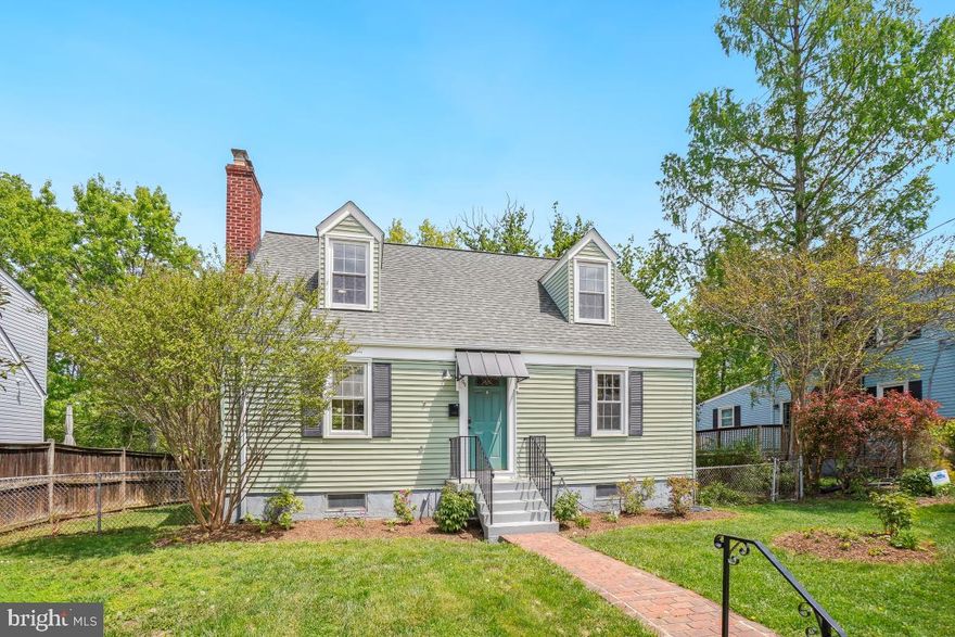 Simply a dream of a location backing onto parkland in the heart of Claremont, a truly neighborly neighborhood.  Wonderfully inviting, this spacious sunny cape seamlessly integrates modern updates with the original character of the home. Updated kitchen with granite countertops, upgraded appliances, new floor and a hammered steel pot rack, giving a stylish, urban feel. The house has many historic touches, including vintage door knobs and black and white mosaic tile in the beautifully updated bathrooms. Four good sized bedrooms and two full baths. Inviting living room with wood burning fireplace, sunny dining room surrounded by windows, beautiful hardwood floors. Finished lower level - great family room space!  Backing onto a nature preserve, miles of trails, two playgrounds, and with a beautiful back deck to enjoy it all - fireflies, cardinals, even groundhogs and fox. Walk a mile on the trail for brunch in Shirlington or catch a show at the theater. The neighbors are warm and friendly, giving the neighborhood an old-fashioned feel. New roof in 2023! Energy efficient ductless heat and cooling keeps everything comfortable and cozy. Spacious and fresh - sunny and inviting. This house is a gem.