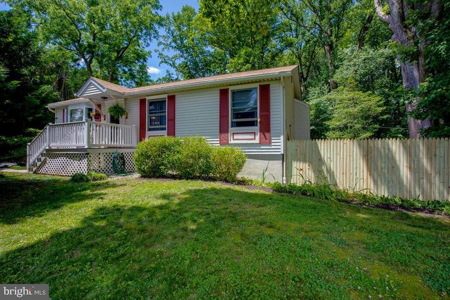 Nature lovers Paradise! Delightful Ranch sited on private lot, conveniently located minutes from Annapolis, the eastern shore, Baltimore and DC.  The home boasts newer Roof, all seasons sun/dining room(including separate Mitsubishi heating and cooling unit), newer natural gas furnace installed 2018 by BGE home- with fabulous warranty), updated bathrooms and Kitchen, Corian counter-tops, finished basement, newer water heater, carpeting, wood stove, Cortec flooring, built in cabinets and shelving.  The home is Surrounded by Natures beauty, A touch of "Walden! Take the Lovers walk to "back 40" where an additional lean-to can be found to store garden equipment! The lot adjoins protected non- Coastal wetlands, and is close to the B&A trail; non-tidal water access is within walking distance where a boat launch can be found. Updates include HVAC with BGE Home warranty (2018), water heater (2018), kitchen (2019), bathrooms (2019; note: all three bathrooms have Coretec waterproof LVT floors), roof (2016),sunroom addition, shed with electric service, new fencing!