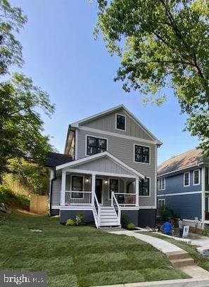 This major renovation and expansion started in 2022 is almost complete in the sought after area that is in close proximity to downtown Silver Spring with an easy walk to the downtown area shopping, restaurants and METRO. Convenience meets elegance! This custom 5 bedroom, 4.5 bath home with over 4,100 finished square feet (ignore tax record) "checks all the boxes" for today's desired features and designs. The floor plan is designed for modern living with an open main and basement level floor plans and large living spaces. The main and top floor offers 3/4" Vintage Scraped solid hardwood flooring. The gourmet kitchen will excite the most avid cook or entertainer with lots of quartz counter space including a large Island with waterfall quartz, upgraded cabinetry, Bosch stainless appliances, including a 36" industrial stove and hood, and beautiful ceramic tile backsplash. The kitchen flows perfectly to the large living family room space with a gas fireplace and designer accent tile and the large dining room space that leads to a large covered deck area in the back overlooking a very large fully fenced backyard space for more entertaining or relaxing space. The den/office on the main floor is the perfect private area for the home office and the custom made nook for everyday backpacks/shoes etc. is the perfect touch of utility and style. This home boasts designer light fixtures and recessed lighting throughout. The master bedroom offers a luxurious space and style with an ensuite owner's bath with soaking tub and marble tile shower for pampering yourself and large "His and Her" closets. The other bedrooms offer more large living spaces with a second master option with its own bath and two other bedrooms that share a hall bath plus a loft area nook perfect for study/play area on this same floor. The basement is perfectly designed with a large finished recreation/multipurpose room with a wet bar and a large 5th bedroom with walk out access and a large storage/utility room option. New HVAC systems, water heater, roof, windows, appliances are all move in ready for your enjoyment and peace of mind. The front of the house does not give you a good indication of the actual space and there are so many more things to talk about this house but seeing it will fill in the gaps. You will certainly fall in love with this home at first sight.
