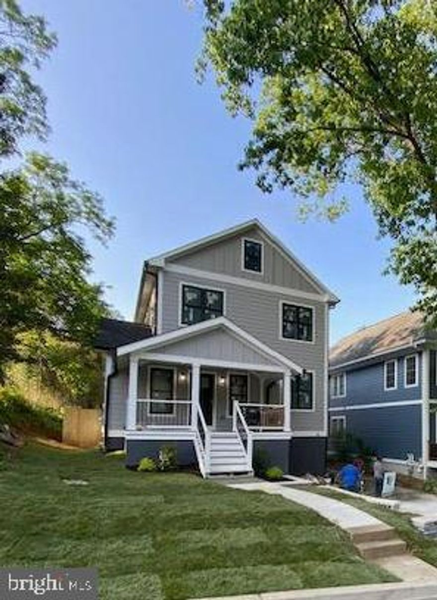 This major renovation and expansion started in 2022 is almost complete in the sought after area that is in close proximity to downtown Silver Spring with an easy walk to the downtown area shopping, restaurants and METRO.  Convenience meets elegance! This custom 5 bedroom, 4.5 bath home with over 4,100 finished square feet (ignore tax record) "checks all the boxes" for today's desired features and designs. The floor plan is designed for modern living with an open main and basement level floor plans and large living spaces.  The main and top floor offers 3/4" Vintage Scraped solid hardwood flooring. The gourmet kitchen will excite the most avid cook or entertainer with lots of quartz counter space including a large Island with waterfall quartz, upgraded cabinetry, Bosch stainless appliances, including a 36" industrial stove and hood, and beautiful ceramic tile backsplash. The kitchen flows perfectly to the large living family room space with a gas fireplace and designer accent tile and the large dining room space that leads to a large covered deck area in the back overlooking a very large fully fenced backyard space for more entertaining or relaxing space. The den/office on the main floor is the perfect private area for the home office and the custom made nook for everyday backpacks/shoes etc. is the perfect touch of utility and style. This home boasts designer light fixtures and recessed lighting throughout.  The master bedroom  offers a luxurious space and style  with an ensuite owner's bath with soaking tub and marble tile shower for pampering yourself and large "His and Her" closets.  The other bedrooms offer more large living spaces with a second master option with its own bath and two other bedrooms that share a hall bath plus a loft area nook perfect for study/play area on this same floor.  The basement is perfectly designed with a large finished recreation/multipurpose room with a wet bar and a large 5th bedroom with walk out access and a large storage/utility room option.  New HVAC systems, water heater, roof, windows, appliances are all move in ready for your enjoyment and peace of mind. The front of the house does not give you a good indication of the actual space and there are so many more things to talk about this house but seeing it will fill in the gaps.  You will certainly fall in love with this home at first sight.