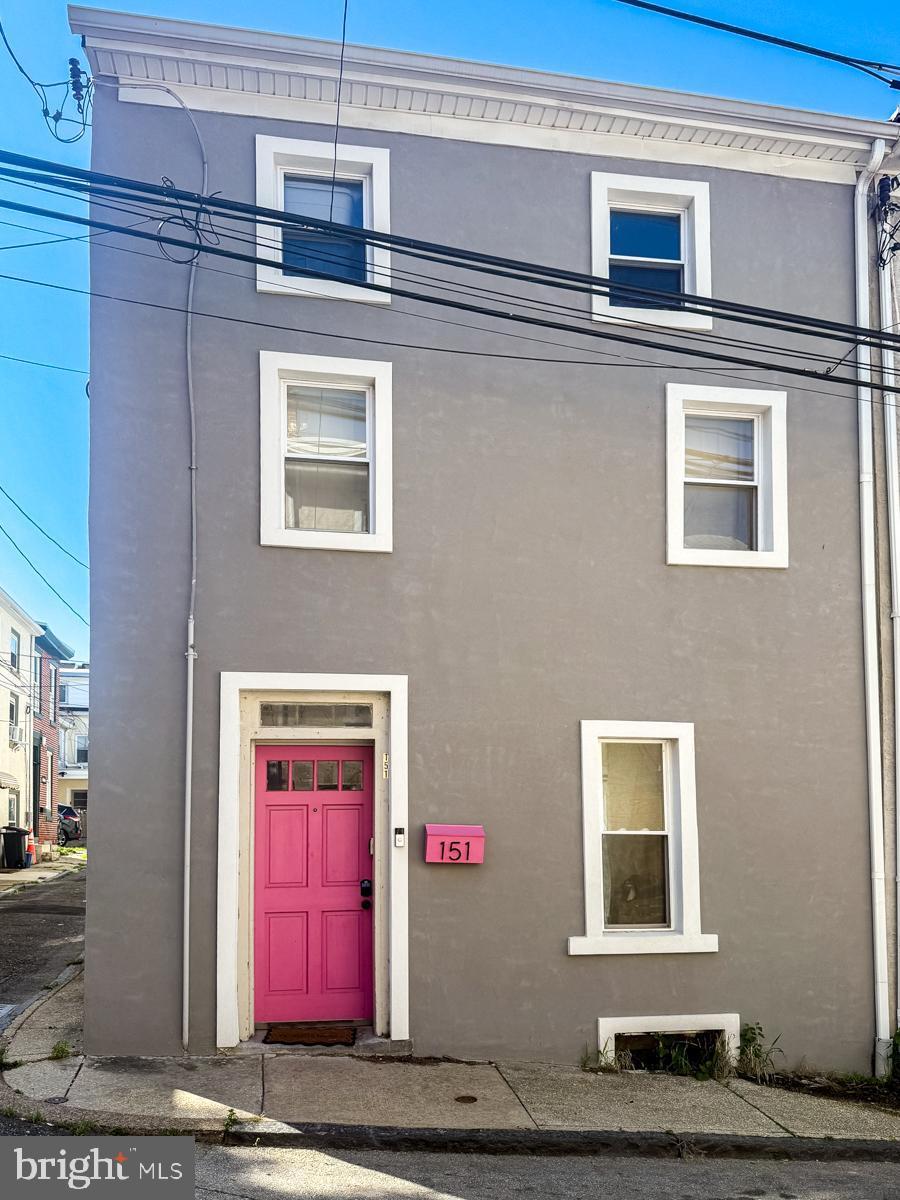 Discover this charming end-of-row home in Manayunk, ideally located just one block from the train station and just a short drive to Center City! Only two blocks away from the vibrant Main Street, you'll enjoy easy access to restaurants, coffee shops, boutiques and all that this lively area has to offer. Featuring two cozy bedrooms and a full bathroom, the interior boasts a stunning stone accent wall that adds character and warmth. The kitchen is equipped with granite countertops and stainless steel appliances, all just three years old. The second floor hosts a spacious bedroom that opens to a private deck, perfect for relaxation. On the third floor, you'll find another generous bedroom with ample space for all your furniture. Plus, an unfinished basement provides extra storage. With its prime location and stylish finishes, this home is a true gem in a sought-after neighborhood. Don't miss your chance to be within walking distance to Main Street and everything it has to offer! Schedule your tour today!