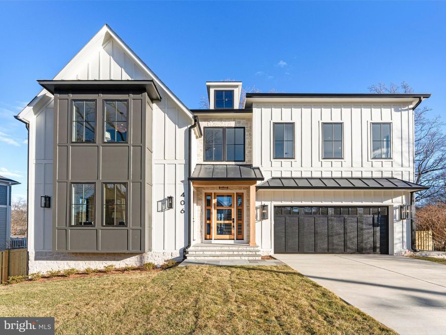 Welcome to this beautifully crafted new home, offering over 5,000 square feet of thoughtfully designed living space on a fully fenced, spacious lot in the heart of Vienna. This home effortlessly blends comfort, style, and functionality, perfect for both everyday living and entertaining.

Step inside the airy two-story foyer and discover an inviting main level with soaring 10-foot ceilings, while 9-foot ceilings upstairs and downstairs enhance the sense of space throughout. Stunning 8-inch European white oak hardwood floors flow seamlessly from room to room, complemented by solid-core doors and custom trim for a sophisticated finish.

At the very heart of the home, the open-concept kitchen and family room provide an ideal setting for gathering and connection. The sunlit family room features a sleek linear gas fireplace with a shiplap accent wall, creating a warm and welcoming atmosphere. The adjoining chef’s kitchen is a true showstopper, equipped with premium Monogram stainless steel appliances—including a built-in 48” refrigerator and 48” gas range—a convenient Delta pot filler, and a striking 9.5-foot waterfall island with prep sink and second dishwasher. Designer maple cabinetry, a quartz integrated backsplash with a ledge, under-cabinet lighting, and a custom walk-in pantry with illuminated shelves ensure that beauty meets function in every detail.

Just beyond the kitchen, sliding patio doors lead to a screened-in deck—perfect for relaxing or entertaining—complete with a ceiling fan, durable Trex decking, and custom hand railings.

Additional highlights include a sun-filled mudroom with built-in cubbies and hooks to keep your entryway organized, and a flexible main-level ensuite (or office) featuring a custom walk-in closet and built-in audio. Upstairs, the owner’s suite is a luxurious retreat with a private sitting area, dual walk-in closets, Juke Audio speakers, and a spa-inspired bath with a wet room, soaking tub, rain shower heads, illuminated niche, dual vanities, and under-cabinet lighting. Three additional ensuite bedrooms and a convenient laundry room with utility sink offer comfort and privacy for everyone.

The lower level expands your options with a spacious recreation room featuring a wet bar and dual-zone beverage center, a bold media room for movie nights, and another private ensuite with walk-in closet.

Curb appeal shines through with stone accents, ColorPlus Hardie Plank and board & batten siding, Andersen windows with sleek black trim, a 30-year architectural shingle roof with metal accents, and a welcoming flagstone front porch. The front-load 2-car garage features an ultra-quiet opener for everyday convenience.

Modern systems such as Delta plumbing and designer lighting, a tankless gas water heater, dual-zone Carrier heating and cooling, two 200-amp electrical panels, and oversized 6-inch black gutters and downspouts provide peace of mind and efficiency.

If you’re looking for a home that truly brings together style and substance—with an open-concept kitchen and family room at its vibrant center—this one is sure to impress.