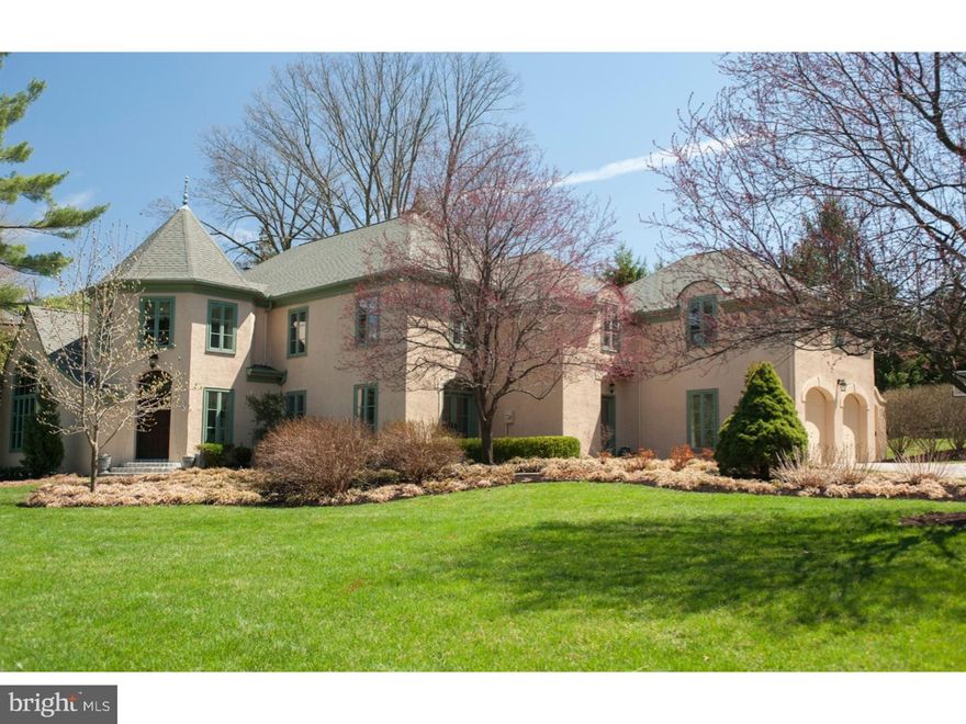 Beautiful Home in unparalleled location with many recent updates. New windows, new granite countertops & kitchen updates, freshly painted, new carpet.  An incredible value in one of the Main Line's most coveted neighborhoods. Elegant European inspired Manor Home with architecture that perfectly complements the magnificent setting.  Exquisite details and character combine with a modern open floorplan offering great flow for entertaining and everyday living.  The dramatic sweeping staircase greets you in the rounded two story Foyer, leading to a center hall flanked by gracefully proportioned formal rooms.  A spacious Living Room with a cast stone fireplace opens to the Library with a vaulted ceiling, arch topped window, built in bookcases, decorative fireplace and wet bar. A holiday sized Dining Room features crown molding, wainscoting and French Doors to the outside gardens.  The open Kitchen-Family Room- Breakfast Area is highlighted by two sets of French Doors opening to the rear flagstone patio's, picturesque yard & gardens.  The centrally located Kitchen features new granite countertops, a new Bosch Dishwasher, new microwave and new stainless steel sink and faucet. The oversized Family room includes a wood burning fireplace and game area. A charming Mud Room offers a convenient transition from the Kitchen to the garage and includes a glass door side entrance.  Upstairs the luxurious Master Suite is accessed through a private hallway, opening on one side to a huge Bedroom with tray celling and French Doors to Juliet Balcony, while the other side opens to a white marble bathroom with dual vanities, oversized shower with dual shower heads and a frameless shower door.  Multiple closets including a large walk in  offer ample storage. Generously sized secondary bedrooms and two additional baths, an exercise room and large Bonus Room with tray celling complete the second floor.  Recent additions include all new Jeld-wen clad windows, new second floor carpeting, Kitchen updates, light fixtures, freshly painted.  Two HVAC systems with humidifiers, security system, natural gas heat, public water and sewer. Abundant attic storage and an 11 X 6 cedar closet offer plenty of storage.  Beautiful exterior gardens, patios and walkways.