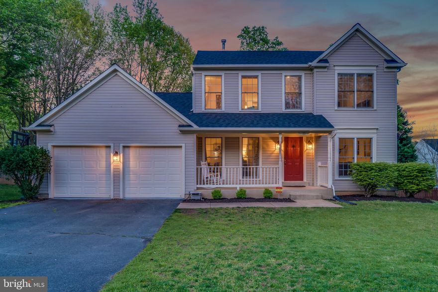 Looking for a neighborhood with tons of amenities, close the shopping, commuter lots and restaurants AND MCB Quantico??  11 Charleston Court is in an awesome neighborhood that  you will love - the highly sought after Park Ridge! This charming home with a country front porch has 4 bedrooms, gorgeous wide plank wood floors and an updated kitchen with granite counters, stainless steel appliances and contemporary lighting.  The open concept family room with vaulted ceilings has a cozy wood burning fireplace.  Upstairs you will find a huge owner's bedroom with vaulted ceilings, spacious walk-in closet and luxury ensuite bath. You'll love the dual sinks, soaking tub and separate shower. 3 more bedrooms and full bath down the hall provide space for friends for family. You will enjoy tasteful designer colors throughout; perfectly updated with all the finishes you are looking for. Ready to relax outside? Mature trees and landscaping surround the deck, patio and fenced backyard; inviting you for leisurely afternoon reading or glass of wine with friends. So much space to grow in the lower level - add another bedroom, bath, media room or yoga studio.  2 car garage with workbench and tons of storage. This home has it all! Commuter lot nearby for the Pentagon or DC.  Check out the video tour and Matterport 3-D walk through!