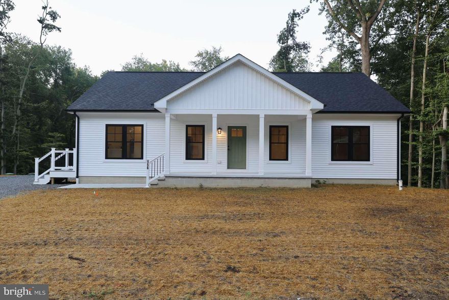 Discover this beautifully appointed New Construction 3-bedroom, 2-bath modern farmhouse rancher, offering 1,600 sq. ft. of stylish, open-concept living in a truly serene and secluded setting. Designed with clean white farmhouse aesthetics, striking black windows, and a warm, inviting layout, this home delivers both charm and modern comfort.
Step inside to an expansive main living area with abundant natural light and effortless flow—perfect for entertaining or quiet evenings at home. The owner’s suite and living room overlook a peaceful wooded backdrop, with the land gently sloping down toward a picturesque stream, creating a rare sense of privacy and tranquility.

The home features a standard gravity septic system, sits in a quiet area free from the constraints of an HOA, and comes with no community dues or fees. Whether you’re seeking a full-time residence or a private retreat, this thoughtfully designed rancher offers beauty, comfort, and a connection to nature that’s hard to find.

A must-see property that blends modern style with natural seclusion—schedule your tour today.