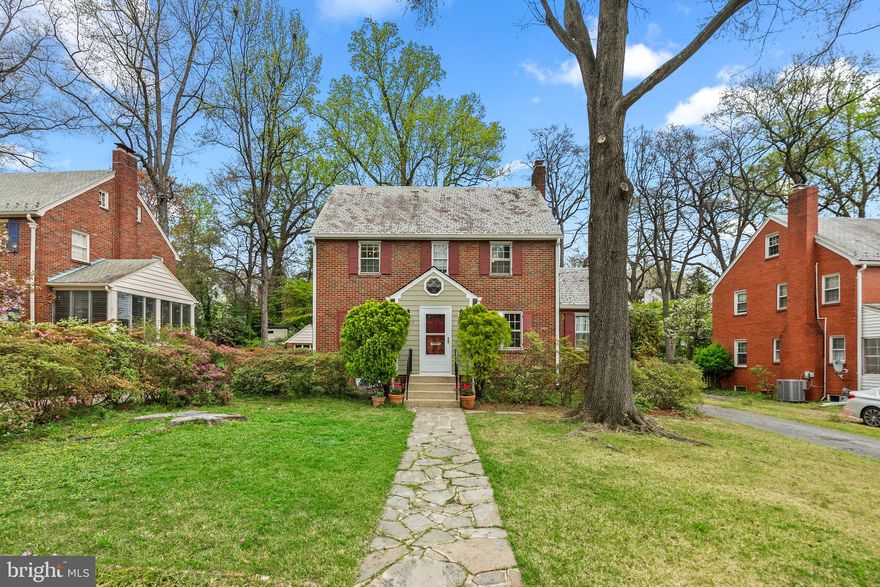 OFFERS DUE TUESDAY, APRIL 16TH BY 7 PM!  Welcome to this expanded brick Colonial on one of University Park's most coveted streets!  All the original charm with the exceptional benefit of a spacious first floor family room addition.  A front entry foyer with coat closet welcomes you into the main level of the home which features a formal living room with wood burning fireplace and built-in shelving, an adjacent den, a formal dining room with built in corner china cabinet, a hall powder room, a large, updated fully-equipped kitchen with cherry cabinetry and unique granite countertops, a wonderful family room addition with vaulted ceiling, skylights, large windows (including an atrium window facing the beautiful rear yard) and both rear and side exterior exits.  Upper level #1 boasts a primary bedroom with ensuite half bath and linen and clothes closet, two additional bedrooms (currently used as offices) and a hall full bath. Upper level #2 features a finished attic with the possibility of being an additional bedroom or home office.  The lower level houses a recreation room with shelving, storage, a full bath and the combination laundry/utility/workshop area with a walk-up exit to the side yard. Radiator and baseboard heat, CAC on the main level, window units for upper levels, ceiling fans, hardwood floors, track & recessed lighting and an abundance of windows are just a few of this home's amenities.  Surrounded by mature hardscape and gorgeous azaleas, this home has everything you need!

It's close proximity to Sports and Recreational facilities, UPES, Whole Foods, Denizens, Burton's, Gold's Gym, Lenscrafters and so much more, including the path to the Riverdale Farmer's Market, Riviera Tapas, and Riverdale Town Market make it the perfect location.  Big Ten sports, The Clarice Smith Center for the Performing Arts and all the wonderful things that the University of Maryland offers are nearby. Ideal for commuting, all major transportation routes (295, 50, 95, 495),  the PG Metro or College Park Metro and the Marc Train are close by.  The Purple Line is under construction!! The very active UP Civic Association has something for everyone: The Azalea Classic, July 4th Parade, Co-op babysitting, Chili Cook-off, and more. University Park offers its own Mayor & Town Council, Police, playground and tennis/pickleball courts.