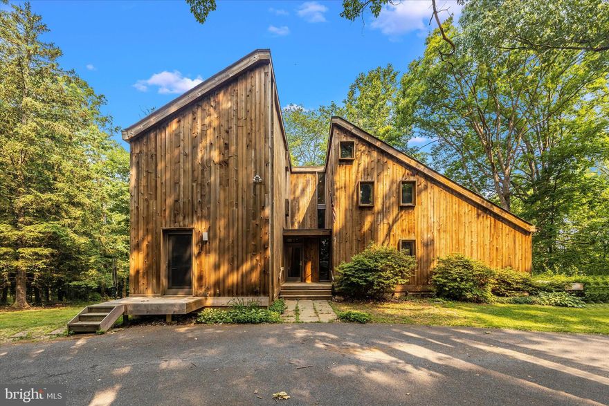 Freshly painted interior and power-washed exterior, full cleaning from top to bottom!  Serenity awaits in this private and tranquil setting improved with a 5-bedroom contemporary-style house designed by a locally renowned architect (William B. Fox).  The home boasts over 3500sq ft of interior space and is situated on a 2-acre lot in the sought after Montgomery Co. MD Agricultural Reserve.  The home features abundant natural light and views of the surrounding picturesque forest which is teeming with wildlife (deer, turkey, squirrels, birds, rabbits).  Partial views of sugarloaf Mtn. (dependent on season).   A partially finished walk-out-level basement has potential for an in-law suite or use as it is for a large hobby/recreation space.  The detached 3-car garage features a heated bay and additional overhead storage, perfect for hobbyists and storage of all sorts!  Close to major commuter routes (270,355,28) and the Marc Train station in Barnesville.  Located within the top-rated Poolesville School District!  Property is offered for sale as-is.