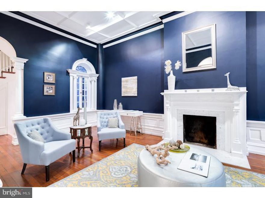 Make this beautiful traditional Rittenhouse Home with contemporary finishes your Center City mansion today!  This spectacular home is an incredible restoration of a 19th century townhouse on a wonderful tree lined street in the center of the Rittenhouse Square Historic District.  It is wide open with high ceilings allowing for tons of natural light and it maintains gorgeous architectural features, including arched doorways, columns, molded ceilings, exquisite marble fireplaces, original pine hardwood floors, traditional leaded glass windows and so much more.  With an extra large living space and separate dining, this home allows plenty of room for entertaining.  There are two gourmet kitchens (one on the lower level with a breakfast nook that overlooks the serene rear garden); both of which feature top of the line finishes, granite countertops, stainless steel appliances and more.  This home has 4 bedrooms, 4 full bathrooms and 2 powder rooms; the master suite has its own en suite bathroom with gorgeous finishes; the third floor has two additional bedrooms, each with their own bathroom and the fourth floor has the fourth bedroom with full bath, as well as access to a roof-top deck with breathtaking views of the city.  You must see it to believe it!  BONUS: Seller will pre-pay 12 months parking in buyer's choice of parking lot with acceptable offer.  PROPERTY JUST APPRAISED FOR 1.635M -- MAJOR VALUE PURCHASE!