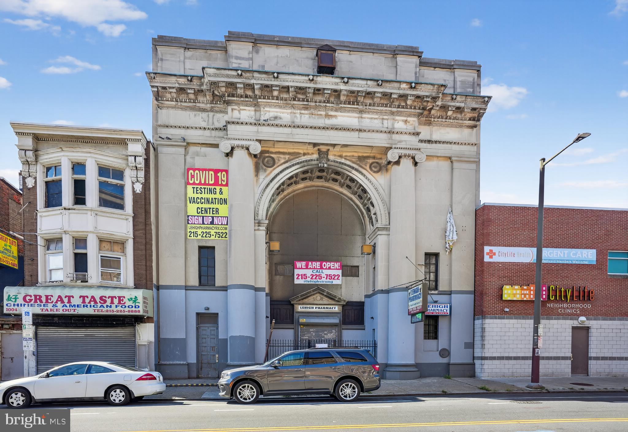 Welcome to 1006-8 Lehigh Ave. HUGE 5700 sq ft commercial property in a high traffic location ! The building's bank history is tied to the neighboring Philadelphia Savings Fund Society (PSFS). 1006 's original structure was built in approx 1915 and was the location of the Lehigh Branch of PSFS, which opened between 1923-1924. The PSFS branch was designed by prominent architects such as Horace Trumbauer and remained in use for decades. Property was last used as a large retail pharmacy "Lehigh Pharmacy". CMX-2 zoning commercial multi-tenant opportunity in an historic former bank building at intersection of W. Lehigh and Germantown Avenues. Located close to The Broad Street Line’s North Philadelphia Station, Temple University’s main campus and includes 7 parking spots in parking lot located behind the building. First floor is built out as an operational pharmacy with a managerial office, storage room, employee break room, changing room, additional retail and pharmaceutical space, welcomed with a grand lobby. Another space houses a doctor’s office with waiting room and a vaccination room. Second floor was a former executive suite with floor-to-ceiling windows and high ceilings. There are three office spaces in the rear of the building. Building has tons of character boasting on large Greek pillars and beautiful original rich mahogany-colored hardwood and marble-tiled flooring. Here is your opportunity to own a piece of city history while running your business there. Opportunity to sublease space to offset operational costs with supplemental income in a location which boats of both high vehicle and foot traffic. Make your offer today !