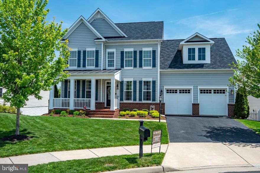 Beautiful single family home in desirable Stone Ridge community. Wonderful curb appeal and located in a cul de sac. Main level is perfect for entertaining with a large open floor plan. Entering through the front door you'll be greeted with engineered hardwood flooring running throughout the main level. A large formal dining room, with plenty of natural light. Adjacted to coat closet and half bath. Spacious kitchen is open to the family room and eat in dining space. Also featuring white cabinets, granite counter tops, large island, stainless steel appliances, 5 burner gas cooktop, pantry and newly installed backsplash. Fantastic outdoor living off of the main level including a screened in deck with gas stone surround fireplace and additional open area composite deck with stairs leading to the backyard. MAIN LEVEL BEDROOM allows for a king size bed, sitting space, walk in closet and an attached bathroom with a walk in shower and great natural light. This space is perfect for multi generational living, a guest suite or additional bedroom/office space. Upstairs you'll find a large primary bedroom with attached covered deck, walk in closet, large soaking tub and walk in shower. 3 additional bedrooms and a full bathroom in the hallway. Laundry is conveniently located in the upper level. Walkout Basement is unfinished with around 1100 square feet of unfinished space and a rough in for a full bathroom. Great for storage or the option to finish partially or fully in the future.  Located in the heart of Loudoun County with top rated schools, close proximity to Dulles International Airport, Shopping, Dining, Commuter Routes/bus stops and Ashburn Metro. Take advantage of all the amenities Stone Ridge has to offer including 3 community pools, tennis courts, playgrounds and amazing events hosted by the HOA.