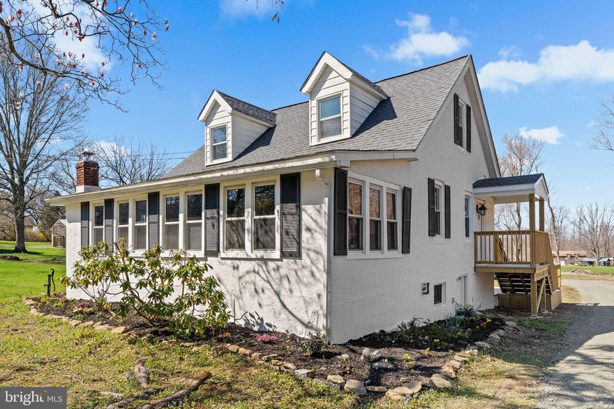 Refreshed Country Cape Cod on 1.44 Serene Acres with 2-Car Garage!
This beautifully refreshed Cape Cod combines authentic historic character with contemporary updates, all set on a sprawling 1.44 acre lot with an oversized two-car garage. This country sanctuary offers a sophisticated yet cozy lifestyle—where you can enjoy wide-open views from your brand-new deck before stepping inside to a home that feels entirely new.

The heart of the home is the modern kitchen, which serves as a showpiece with its sleek granite countertops, stainless steel appliances, new cabinetry, and updated fixtures. This space flows effortlessly into the formal dining area—an inviting setting for gatherings of any size. The living and sitting areas preserve the home's original soul, highlighted by exposed beams, wood accent walls, and a wood-burning stove set against a stunning stone wall. Continuing on the main level, the primary suite has been thoughtfully expanded to comfortably accommodate a full suite of furniture. Just steps away, the full bathroom has been completely reimagined with a newly tiled shower and tub combination, a fresh vanity, and a new toilet—all supported by updated PVC and Pex plumbing.

Upstairs, two sizable bedrooms featuring dormer bump-outs provide extra square footage, finished with fresh paint and brand-new carpeting. Spend early mornings enjoying a coffee outside on the extensive deck. For the hobbyist, the property features a detached shed specifically outfitted as a workshop space—now featuring new dedicated electric to support everything from weekend DIY to professional-grade projects.

Beyond the aesthetic updates, this home offers peace of mind with significant mechanical upgrades. The electrical service has been updated to 200 amps for the main house, with new electric also extended to the garage and shed. Recessed lighting has been installed throughout to enhance the bright, airy feel, complemented by thermal windows,  new flooring, and fresh paint from top to bottom. 

The location offers the best of both worlds—peaceful, rural living that remains perfectly connected. Enjoy a simplified commute with a quick drive to the PA Turnpike, or spend your weekends at nearby Green Lane Park—a local landmark for community events, hiking, and boating.

Schedule your private tour today to experience this beautiful country escape for yourself!