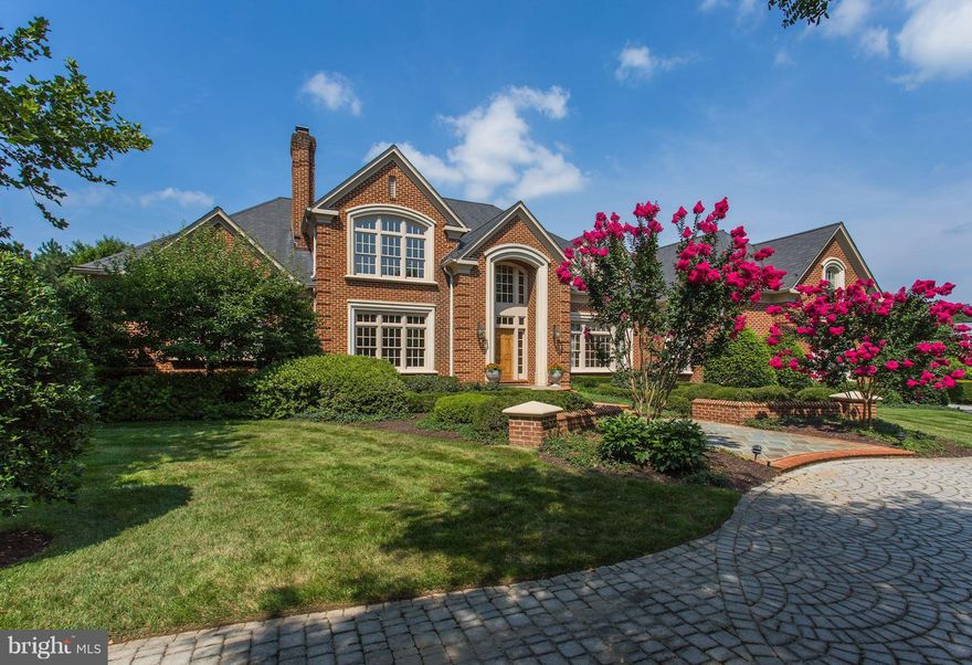 Custom estate in highly sought after Woodlea Mill. Stunning residence w/ marble 2-story foyer, updated gourmet eat-in kitchen, main level master suite w/ private terrace & hot tub, sunroom, handsome wood paneled study, 4 fireplaces, au pair suite, fully finished LL w/ exercise room & bar, Large private lot w/ pool & pool House w/ full bath, yard, & tons of privacy.  Minutes to Tysons & metro.