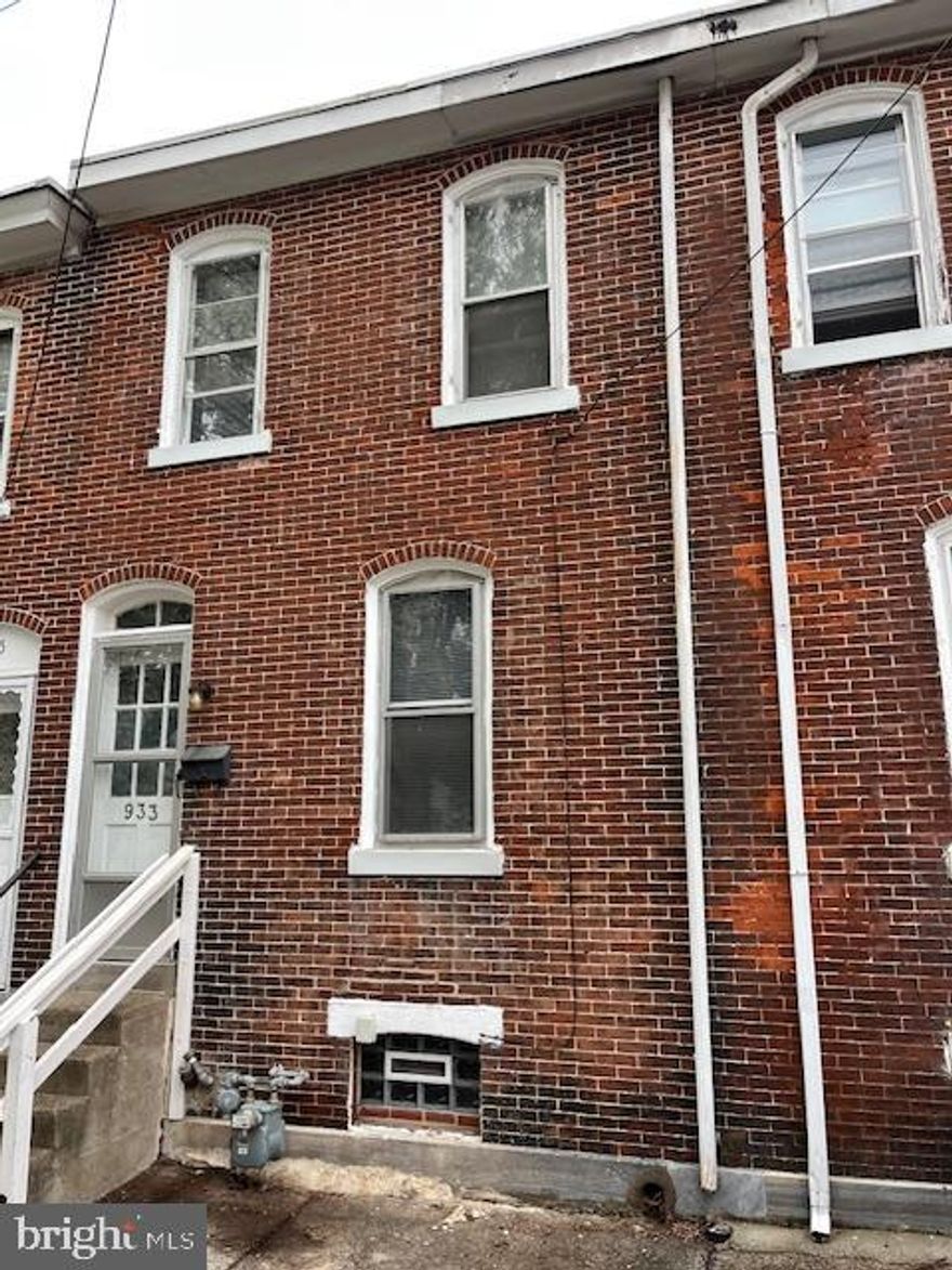 Modern home on quiet street featuring a large rear yard and laundry room on second floor.