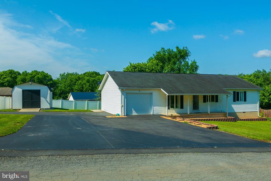 PROUD TO OFFER THIS  RANCHER  ON 1/3 AC WITH 3 BEDROOMS AN 2 FULL BATHS -1 CAR GARAGE  HUGE PAVED PARKING AREA COVER DECK IN BACK -FENCED YARD  WHITE VINIL-2 STORGAGE BUILDING 1 WITH ELECTRIC  IDEAL WORKSHOP OTHER FOR STORAGE ALSO VIDEO MONITORING  ON PREMISE AND WILL STAY   AND  NEVER  USED GENERAC BACK UP  ELECTRIC SYSTEM,LP TANKS ARE RENTED-INSIDE WELL KEEP  GRANITE COUNTER TOPS APPLIANCES  OPEN DESIGN AND PELLET STOVE CONVEYS-WALK OUT TO BACK ENCLOSED DECK 12X24 .MAST  BEDROOM IS OVERSIZED AS WELL AS MAST.BATH- WITH 2 OTHER BEDROOMS AS WELL-LOCATION BETWEEN MARTINSBURG  AND GOLF COURSE AN  STONE BRIDGE AN OPEQUON CREEK . ALL ON 1 FLOOR  FROM GARAGE INTO HOME. WELL KEPT AND MANY EXTRAS