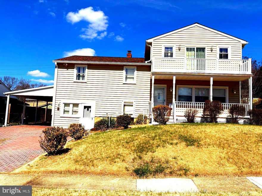 Welcome to this beautifully renovated split-level home, where modern comfort meets timeless charm.  This home has five spacious bedrooms and three full bathrooms, providing ample space for relaxation and entertainment. The main level of the home has an inviting open floor plan that seamlessly connects the family room to the kitchen, perfect for gatherings and everyday living. The kitchen is newly updated and features granite countertops and a cozy table space that invites casual dining. Newly refinished hardwood and luxury vinyl plank flooring flow throughout. Retreat to the huge primary suite which occupies it's own upper level of the house. The en-suite bathroom provides a spa-like experience with two toilets and double sinks. In addition, the primary suite has access to a private rear balcony and a front balcony as well. Ideal for morning coffee or evening gatherings under the stars.   On the first upper level there are 3 spacious bedrooms and a full bath ensuring comfort and privacy for all. The lower level has a bedroom space with a full bath and separate entrance perfect for an in-law suite or whatever you choose to make it.  The 2025 renovation has elevated the property with updated features that cater to a modern lifestyle of comfort and convenience.  Outside, the yard is complemented by a brick driveway leading to an attached carport, providing both functionality and curb appeal.  With its blend of modern amenities and classic design, this home is a sanctuary that promises comfort, style, and a sense of belonging. What a great place to call HOME!