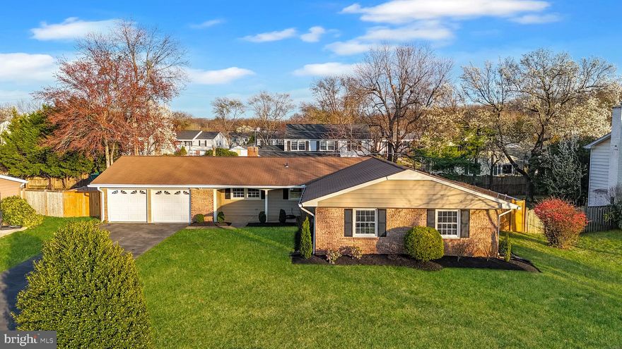 ***Catered Open House Saturday 12-2PM***As soon as you arrive at this Greenbriar home, you feel its warmth and charm – the curb appeal is fantastic with a manicured lawn, blooming shrubs, and a classic brick-front ranch style welcoming you (and there’s no HOA to worry about!). Step inside to an open, sun-filled living and dining area where rich hardwood floors (2016) flow underfoot, and recessed lighting and relocated HVAC ductwork (moved to the attic in 2016) give the space a bright, airy feel.

The heart of the home is the beautifully remodeled kitchen (2016), which opens to the living area – here you’ll find modern wood cabinetry, gorgeous granite countertops, exposed brick accents, and stainless steel appliances that make cooking and entertaining a joy. Just off the kitchen, there’s a sense that this is where everyone naturally gathers – whether you’re hosting friends for the holidays or enjoying a quiet morning coffee, the layout is both spacious and comfortably familiar.

Down the hall, the primary suite is a true retreat thanks to a master bathroom remodel in 2016 that added a spa-like zero-threshold shower, sleek tile work, and contemporary fixtures. An updated second full bathroom (2016) down the hall means family or guests get to enjoy the same modern style – subway tile, a deep soaking tub, and stylish finishes – no updates needed there.

You’ll also have peace of mind knowing that all the big-ticket items have been taken care of: a Lennox HVAC system keeps the home cool in summer, a new roof (2013) and a 50-gallon A.O. Smith hot water heater (2017) provide efficiency and reliability, and a brand new Bryant furnace (2025) with a 20-year warranty means you’ll be cozy for many winters to come. The two-car garage and extended driveway offer plenty of parking for you and your guests, and the fenced backyard (visible through the many windows that let in great natural light) is ready for weekend barbecues, playtime, or just unwinding in privacy.

Perhaps one of the best things about this home is its location – tucked in the heart of the established Greenbriar neighborhood of Fairfax, you’re moments from Great Schools 8/10 ranked Chantilly High School, parks, and the community swim club, as well as Greenbriar Shopping Center for groceries, dining, and more. Plus, you have easy access to major routes like 50 and I-66, making commutes or trips into DC a breeze. It’s not just a house with upgrades – it’s a home that’s been lovingly cared for and updated so you can simply move in and start making memories. From the welcoming front porch feel to the modern touches inside, this is the kind of place where you can truly envision yourself living comfortably for years to come, hosting loved ones, and enjoying all the conveniences of Greenbriar living.