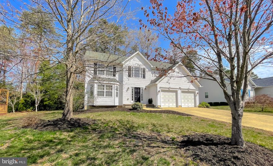 LOVELY TWO STORY IN DESIRABLE WILLOW WOODS NEIGHORHOOD.  ONLY MINUTES TO PAX RIVER, PARKS, SHOPPING AND SCHOOLS.  THIS WELCOMING FLOOR PLAN HAS HAD MANY RECENT UPDATES TO INCLUDE FLOORING, COUNTER TOPS, CABINET RE-FRESH, BATHROOMS AND MUCH MORE!   IN MOVE-IN CONDITION AND READY FOR YOU!  THE TWO STORY FOYER  WITH TONS OF NATURAL LIGHT WELCOMES YOU .  AS YOU MOVE FORWARD YOUR GREATED BY A BEAUTIFUL KITCHEN THAT HAS A CENTER ISLAND, NEW QUARTZ COUNTERS, SS APPLIANCES AND ALL NEWER APPLIANCES.  FORMAL DINING AND LIVING ROOM IS OFF TO YOUR LEFT.  THE KITCHEN OPENS TO A BREAKFAST AREA THAT LEADS YOU TO THE FAMILY ROOM WITH A GAS FIREPLACE AND SLIDING GLASS DOORS TO THE DECK OVERLOOKING THE PRIVATE BACKYARD.  UPSTAIRS YOU'LL FIND A LARGE PRIMARY SUITE WITH WALK-IN CLOSET AND DELUXE BATH.  THERE ARE 3 MORE BEDROOMS, A FULL BATH AND LAUNDRY.    *WIRING IN PLACE FOR ELECTRIC PLUS/CHARGER FOR YOUR CAR* * JUST BRING YOUR PREFERRED EQUIPMENT *