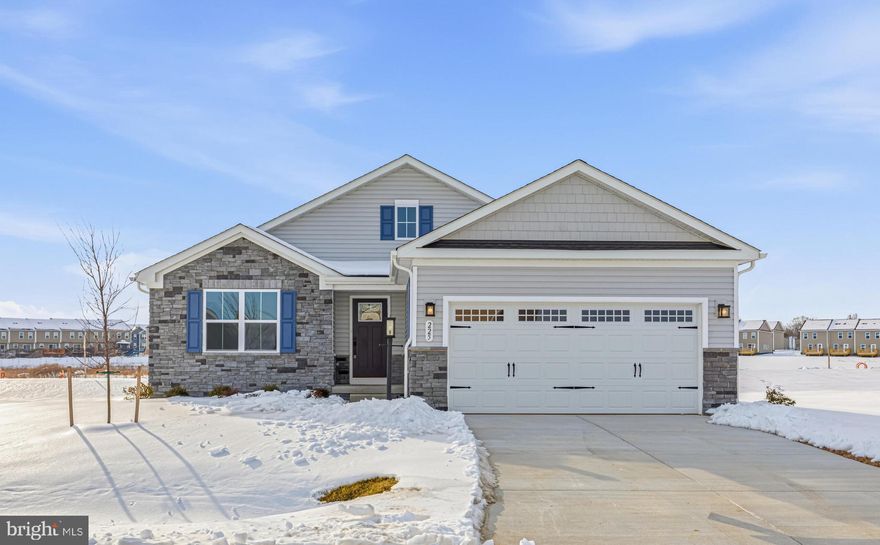 This is your chance to own a brand-new, never-lived-in, model home. This 3-bedroom DOMINICA SPRING, at Burwell in Martinsburg, is fully COMPLETE and is being used as an undecorated model.  It provides a rare opportunity to move into a space that has never been personalized, giving you the freedom to make it entirely your own.  The beautifully functional kitchen features an upgraded interior design package and cabinets w/ island, stainless steel appliances and granite countertops. The LVP throughout the kitchen, dining and great room areas make upkeep a breeze!  Need a formal dining room or additional flex room?  The Dominica Spring has it!  Ceiling fan rough-ins and an LED light package have also been added for additional comfortability and lighting.  Your main-level owner's suite boasts a spa-like bathroom w/ seated shower, ceramic shower surrounds and double-bowl vanity.  Washer and dryer are included in the laundry room, which also has a laundry tub! The full basement has been partially finished w/ a rec room and full bath, leaving plenty of space for storage, as well.  With modern design and premium finishes already in place, you can secure your future address today and look forward to moving in April 2026 (delayed settlement due to model home use).  Burwell is conveniently located w/ shopping, dining, medical facilities and schools within a 3-mile radius - just 15 minutes to Hagerstown & 45 minutes to Frederick. Major commuter routes are nearby making day-tripping to the DC/Baltimore areas a breeze.  Prefer the Marc Train?  it's just a 10-minute drive from this community.  With a local brewery and distillery nearby, you can enjoy happy hour w/ friends while still being close to home.  Many historical sites are located in the Berkeley County area with the C&O Canal just 15 minutes away for walking, biking or fishing along the Potomac River and don't forget, Harpers Ferry is just 30 minutes away!  Beautiful, lush countryside abounds, making Burwell a peaceful place to come home to.  Closing Cost assistance available w/ the use of seller's preferred lender.