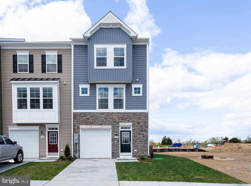 ***FOR A LIMITED TIME, OFFERING UP TO 15K INCENTIVE FOR PRIMARY RESIDENCE WITH USE OF PREFERRED LENDER AND TITLE. CONTACT SALESPERSON/CONSULTANT FOR DETAILS***
Come home to Berkeley County’s premier planned community featuring a clubhouse, swimming pools, walking trails, lush landscaping and mountain views. The Darlington II with stunning elevation 2. A 3 level townhome with 1 car garage featuring 3 Bedrooms and 3.5 Baths. The covered front porch leads directly through the front door into the spacious lower level including 9 ft. ceilings, foyer with a double coat closet, access to the garage continuing into the fully finished lower level recreation room with full bath and walkout access to rear yard with privacy fencing. This home features an alternate 3 level morning room extension and oak staircases throughout. Open concept main level with 9 ft. ceilings, luxury vinyl plank flooring throughout this level, dining room and kitchen with stainless appliances, large 8’ plus island, upgraded level 2 kitchen cabinets & quartz countertops, that leads directly into living room with powder room. The primary suite includes a tray ceiling and large walk-in closet The primary bathroom includes a vanity, separate soaking tub. Laundry is located on the bedroom level. *Photos may not be of actual home. Photos may be of similar home/floorplan if home is under construction or if this is a base price listing.