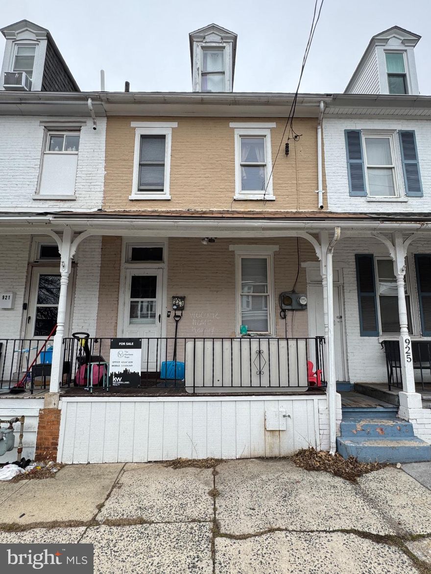 This charming Colonial townhouse, built in 1900, offers a prime investment opportunity in a vibrant downtown location. With 1,207 sq. ft. of finished space, this property features three bedrooms and a full bathroom, making it ideal for rental potential. The interior boasts a functional layout with a bathroom equipped with a tub shower, and convenient main floor laundry hookups. The exterior showcases classic brick and stone construction, complemented decent size outdoor deck to further enhance outdoor living. The lot, measuring 0.05 acres, includes a rear yard, perfect for small gatherings or gardening. Sidewalks in the neighborhood promote walkability, while off-street parking and a concrete driveway add convenience for owners/tenants. Key appliances include an electric oven/range and refrigerator, ensuring a move-in-ready experience for renters. The unfinished basement is perfect for extra storage. Located less than a mile from public transportation, this property is positioned for easy access to city amenities, enhancing its appeal to prospective tenants. With a solid foundation and room for improvement, this townhouse represents a promising investment with potential for strong returns in a growing market.