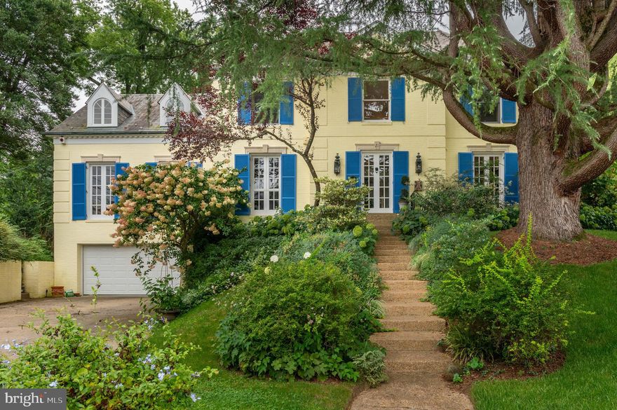 New Major Price Improvement! Located on a serene, private .34 acre lot on a cul-de-sac in the highly sought-after Chevy Chase neighborhood, this exquisite lovingly cared for home transports you to the French country and highlights beautiful finishes, oversized windows, and custom built-ins. The English garden landscaping and pool complement the spacious 4,500+ square foot floor plan, giving the home an excellent flow for entertaining and everyday living. The one-of-a-kind, multi-level garden features a large, stunning heated in-ground pool, garden, and a variety of flowers and plantings that bloom throughout the year, creating a true outdoor retreat. The main level boasts a sun-drenched formal living room with a window seat with views of the pool and gardens and wood-burning fireplace. The living room opens up to the elegant dining room and family room with custom built-ins, wood-burning fireplace, and French doors leading to the expansive back patio. At the center of the home is a sun-filled, gourmet eat-in kitchen with granite and limestone countertops, ample cabinetry, center island, and high-end stainless steel appliances. Completing the main level is a private office with a wet-bar, welcoming foyer with a coat closet, and powder room. 

The second level features four generously-sized bedrooms and three full bathrooms. The primary suite has a large window with views of the garden oasis and boasts a dressing room complete with ample storage and an ensuite bathroom with a walk-in shower and separate tub. The third floor offers an additional bedroom with an ensuite bathroom and an expansive attic space with the potential to be finished, offering endless possibilities for additional living space or storage. Rounding out this exceptional home is the lower level with a recreation room, bonus room with an ensuite bathroom, ample storage, laundry area, and access to the attached two-car garage. This home is ideally located within close proximity to the new shops and restaurants in Chevy Chase, downtown Bethesda, Rock Creek Park and the future Connecticut Avenue Purple Line stop with all of its surrounding shops and restaurants.