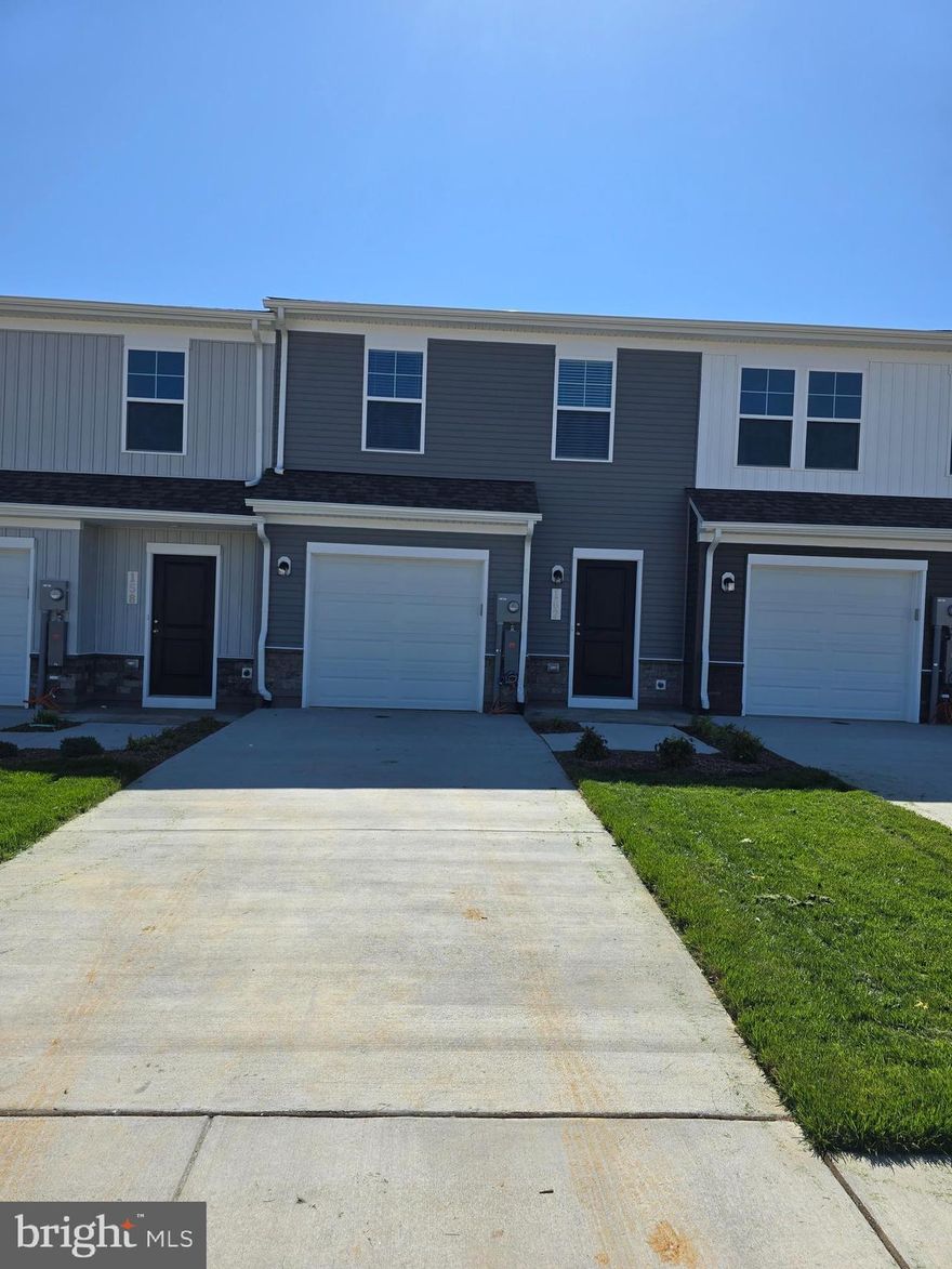 Move-in ready!

Ceiling Fans/Blinds installed...

 Be the first to experience this unique two-floor living design, available exclusively in Charlestown. This brand-new townhouse is perfectly located in the first community you'll reach when coming from Northern Virginia. Enhance your lifestyle at The Rutledge at Essence at Stone Spring, a delightful 3-bedroom, 2.5-bathroom townhouse that perfectly blends modern amenities with traditional aesthetics. Step inside to a welcoming family room on the main level, ideal for relaxing or entertaining. The open-concept kitchen and dining area make it easy to cook and converse simultaneously. Upstairs, the primary bedroom includes an ensuite bathroom for daily indulgence, and two additional bedrooms provide ample space for family or guests, supported by another full bathroom. Located just steps from Potomac Marketplace, you'll enjoy easy access to shopping and dining with stores like Weis, Kohls, and Home Depot, and eateries such as Panera Bread and Chick-fil-A. Outdoor enthusiasts will appreciate the proximity to Jefferson County Memorial Park, the Potomac and Shenandoah River Parks, and the Appalachian Trail. Adventure is never far with Harpers Ferry and Charles Town's Hollywood Casino close by, plus Virginia's renowned wineries and breweries just a drive away. Commuting is effortless with routes like Route 9, Route 340, I-81, I-15, and Route 7 to Leesburg, and convenient MARC Train access at Duffields and Harpers Ferry. Enjoy upcoming on-site amenities, including a playground, a shared green space with a dog park, and a scenic trail leading to Stream Valley Park. Touring and Rental Details: Tours available: Schedule a visit by appointment. Rental Requirements: Credit Score: Minimum of 650. Income Requirement: Must have a gross income of at least 2.5 times the rent. 

Security Deposit: Equivalent to one month's rent. Minimum 12 months lease.