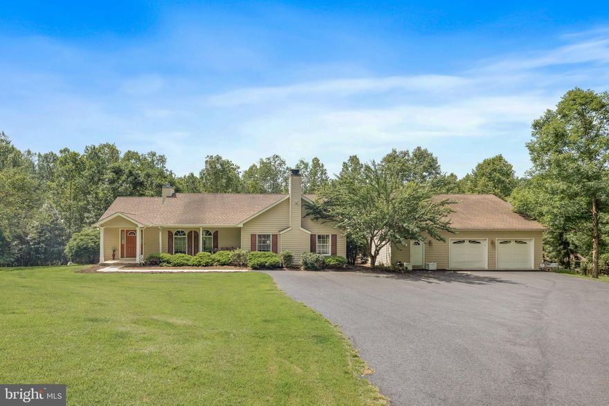 Now priced below appraised value!  Welcome to 3930 Gilbert Station Rd, a private retreat on 6 peaceful acres, with a huge detached garage/workshop and no HOA! This charming one-level home is move-in ready and waiting for you. Step inside the home to the front entry room, with tile flooring and closets. The eat-in kitchen features stainless appliances, and steps out to the light-filled sunroom. The owner’s suite includes a walk-in closet and en suite bathroom, with a tiled walk-in shower.  A second bedroom and full bathroom are on the left side of the home. The third bedroom just needs a door, and is currently set up as a cozy den / family room, with a brick wood-burning fireplace, half bathroom, and separate laundry room.  The two-car detached garage includes a private entryway, a conditioned workshop room (or office), and staircase to a large attic space, currently used as storage.  Enjoy the outdoors on the covered front patio or the huge composite back deck, which overlooks the large backyard.  A shed is in place with a run-in, perfect for a mower or outdoor tools.  Enjoy country living with no HOA, while being not far from Preddy Creek Trail Park, NGIC, Charlottesville Albemarle Airport, shopping, vineyards, and more. Don’t miss your chance to own this incredible property!