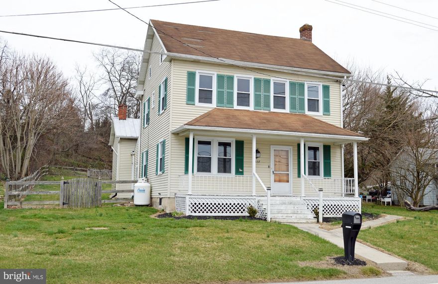 Renovated three level 4 Bedroom, 2 1/2 Bath Colonial.  Come inside and you will find luxury vinyl plank flooring throughout the main level that features a remodeled kitchen with stainless appliances and separate pantry room, separate dining room, living room and family room with crown molding.  Escape to the 2nd floor where you will find 3 nice sized bedrooms with new carpet, a full bath, and a sitting room leading the way to the private third floor primary suite.  Outside you will find the summer kitchen with the charm of yesteryear with a 2nd floor, a large covered patio, and a fenced in rear yard leading to the parking area at the rear of the lot.  And don't forget the garage/storage for additional storage space.   Come and make this your home today!